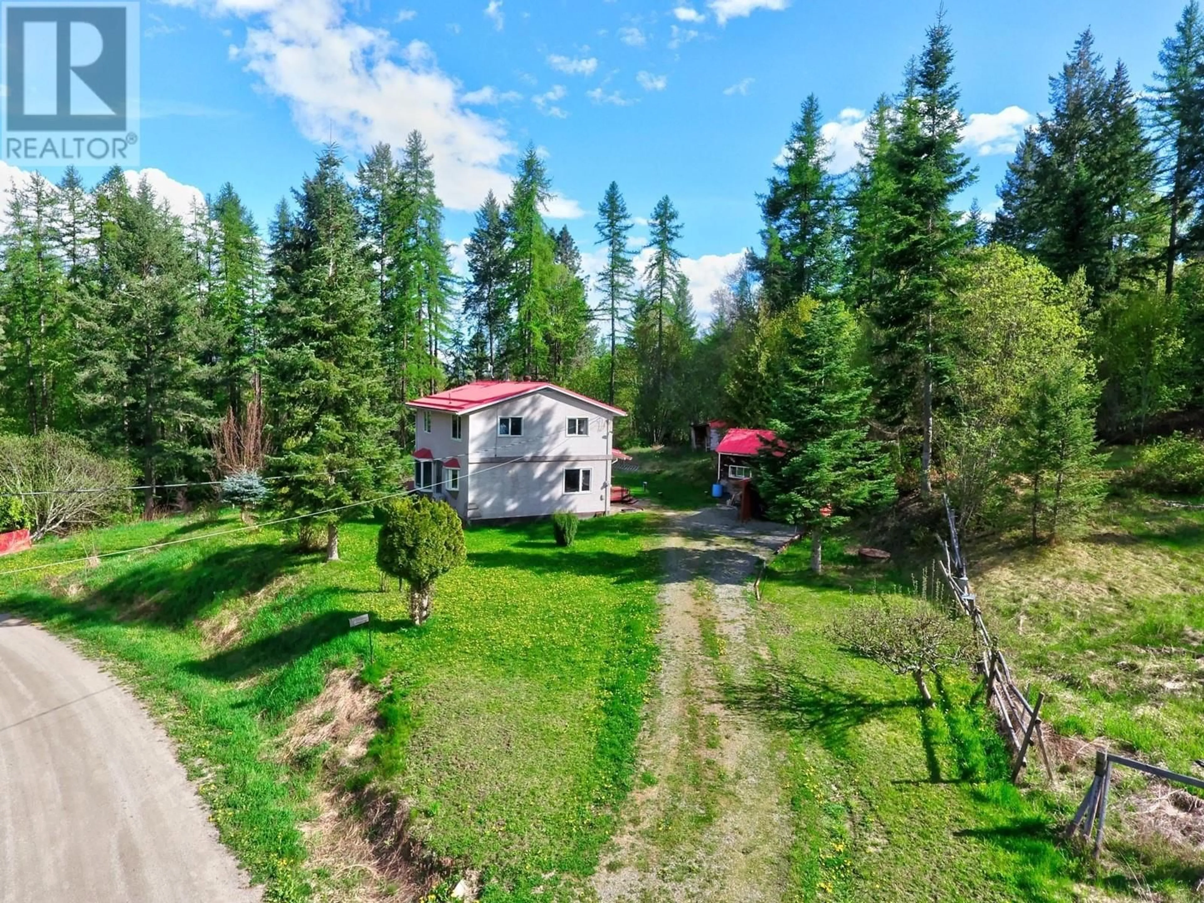 A pic from outside/outdoor area/front of a property/back of a property/a pic from drone, forest/trees view for 1365 GRANARY ROAD, Creston British Columbia V0B1G7