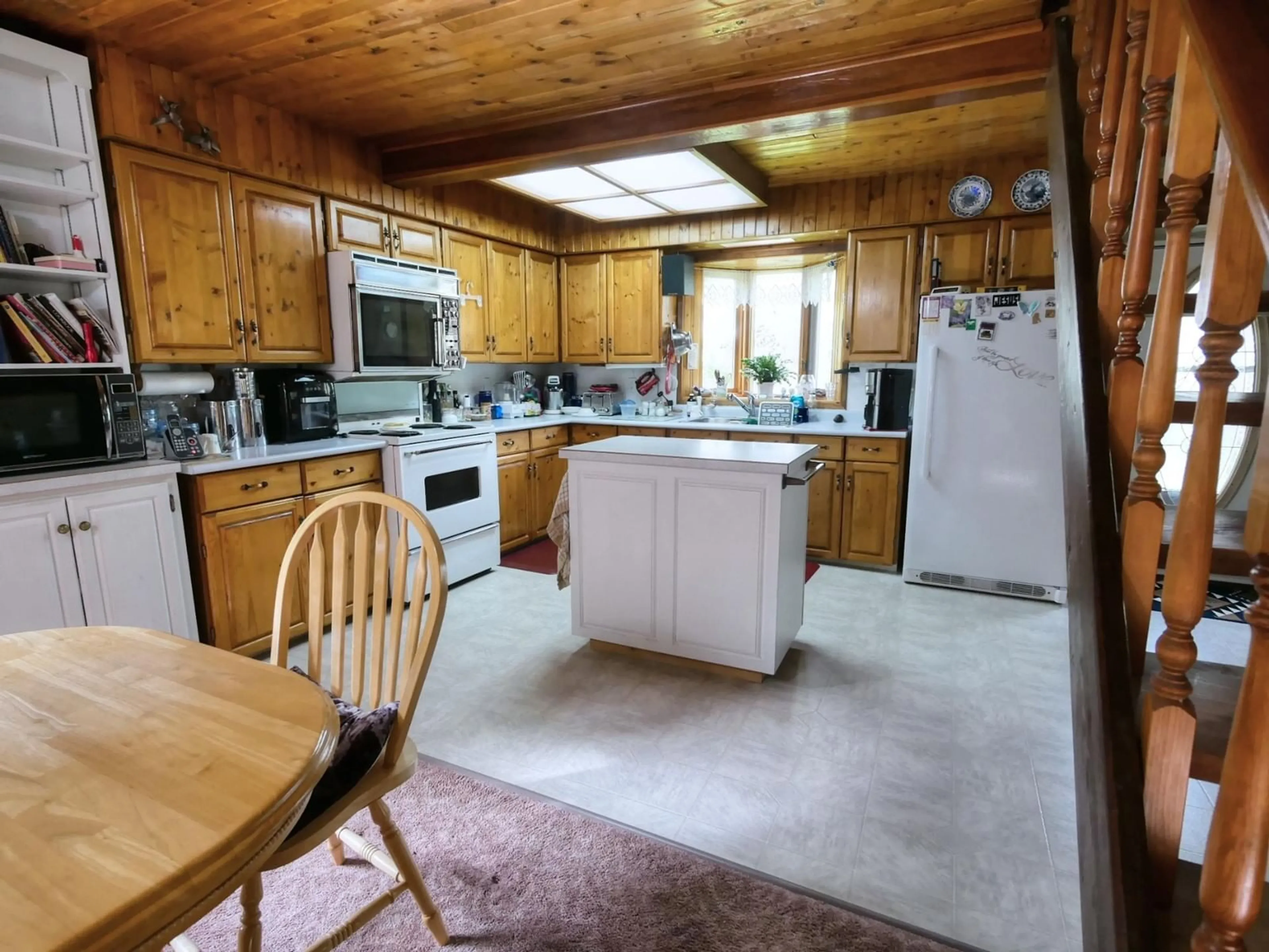 Kitchen, wood floors, cottage for 1365 GRANARY Road, Creston British Columbia V0B1G7