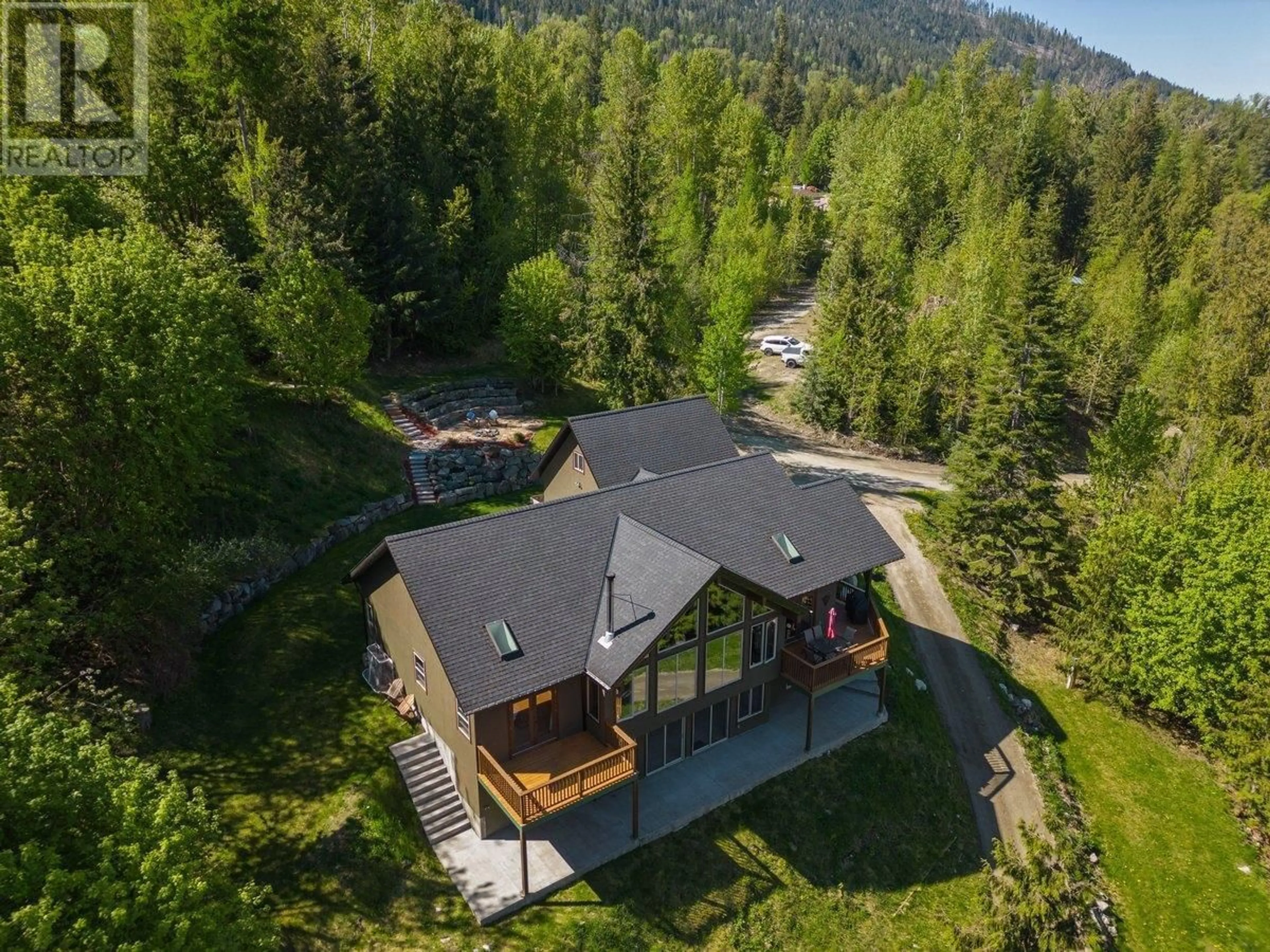 A pic from outside/outdoor area/front of a property/back of a property/a pic from drone, forest/trees view for 3213 VINDUSKY ROAD, Nelson British Columbia V1L6X7