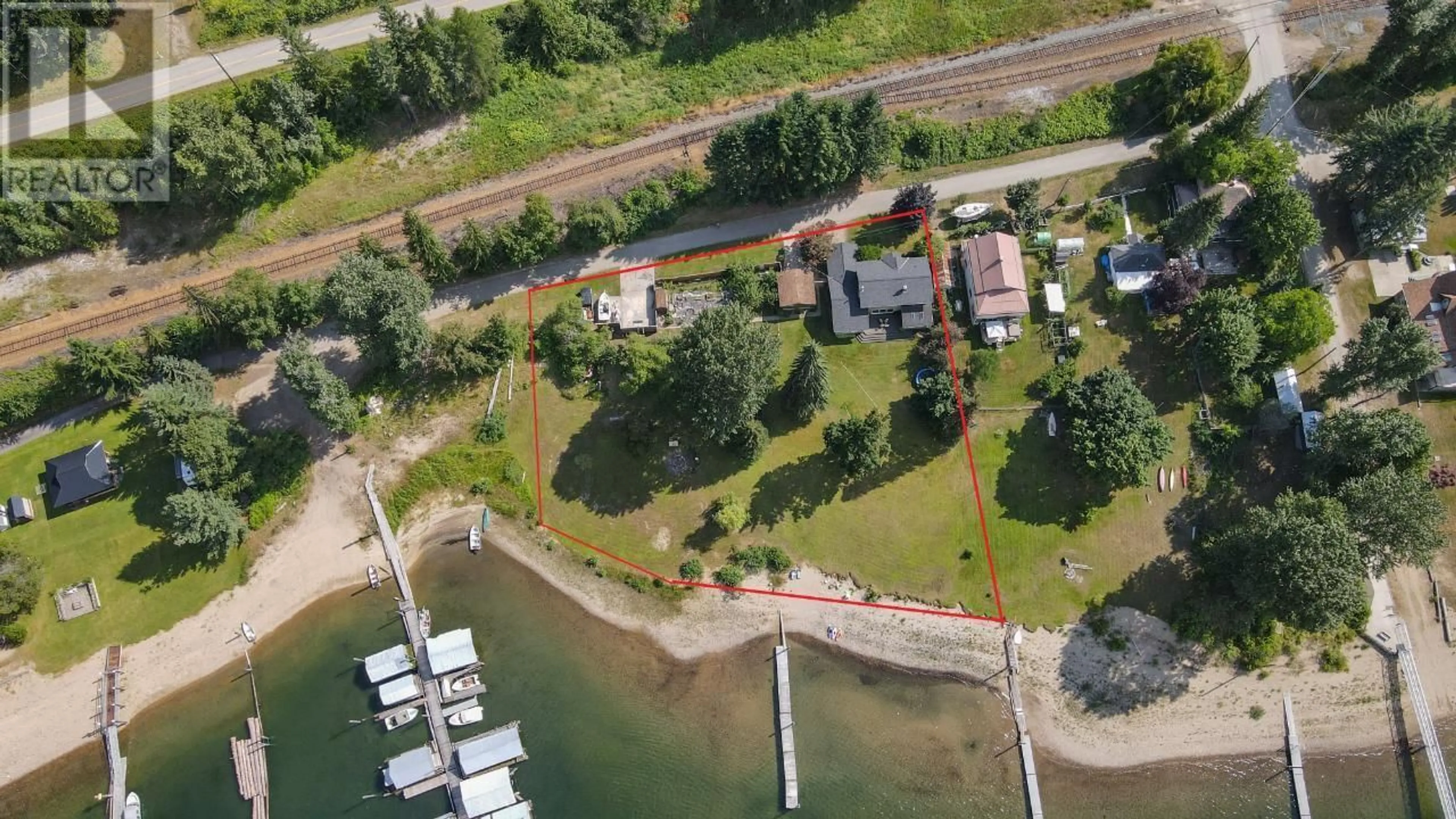 A pic from outside/outdoor area/front of a property/back of a property/a pic from drone, water/lake/river/ocean view for 8119 MUNCH ROAD, Procter British Columbia V0G1V0