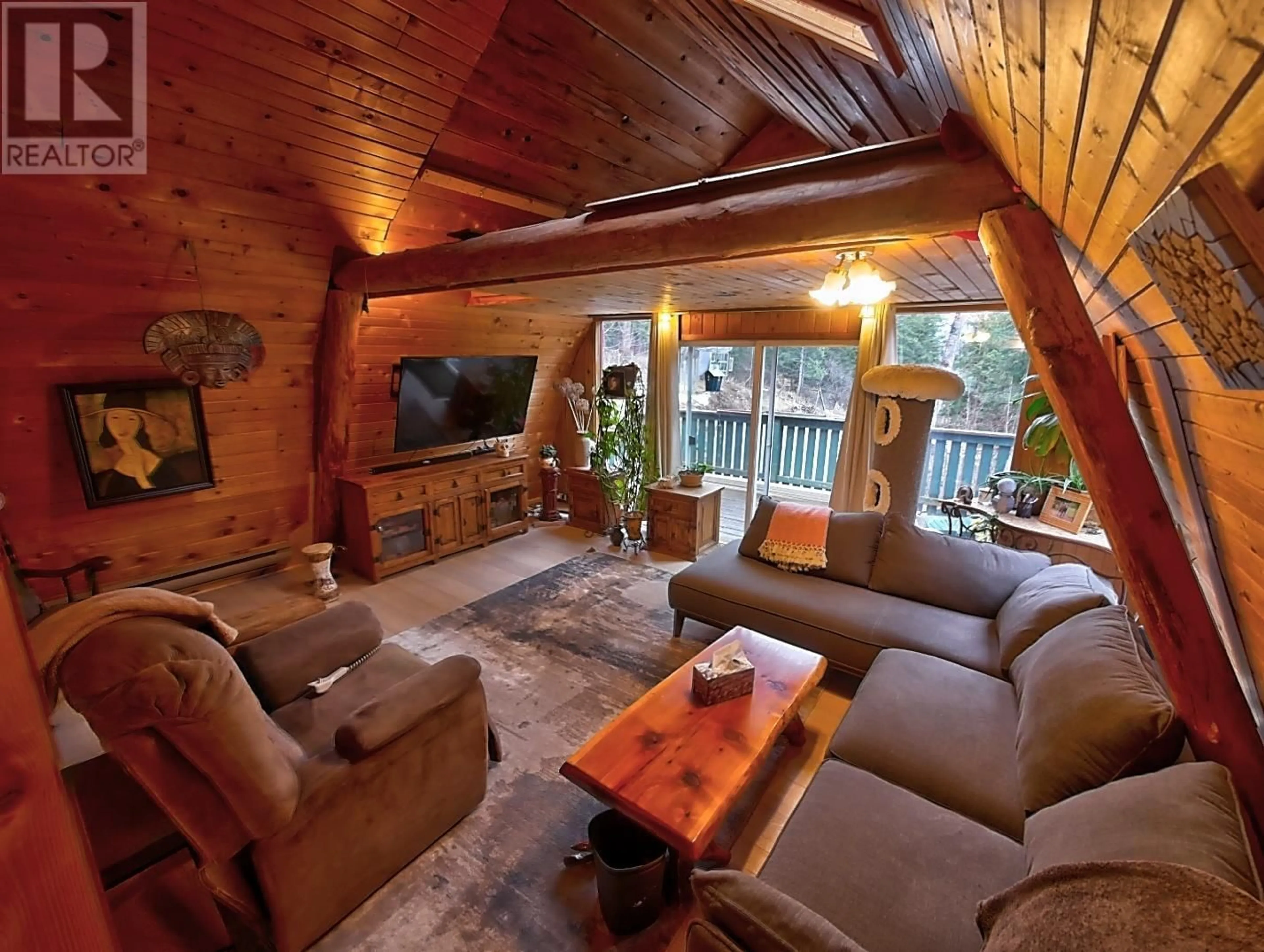 Living room with furniture, wood/laminate floor for 1608 ZWICKY ROAD, Kaslo British Columbia V0G1M0
