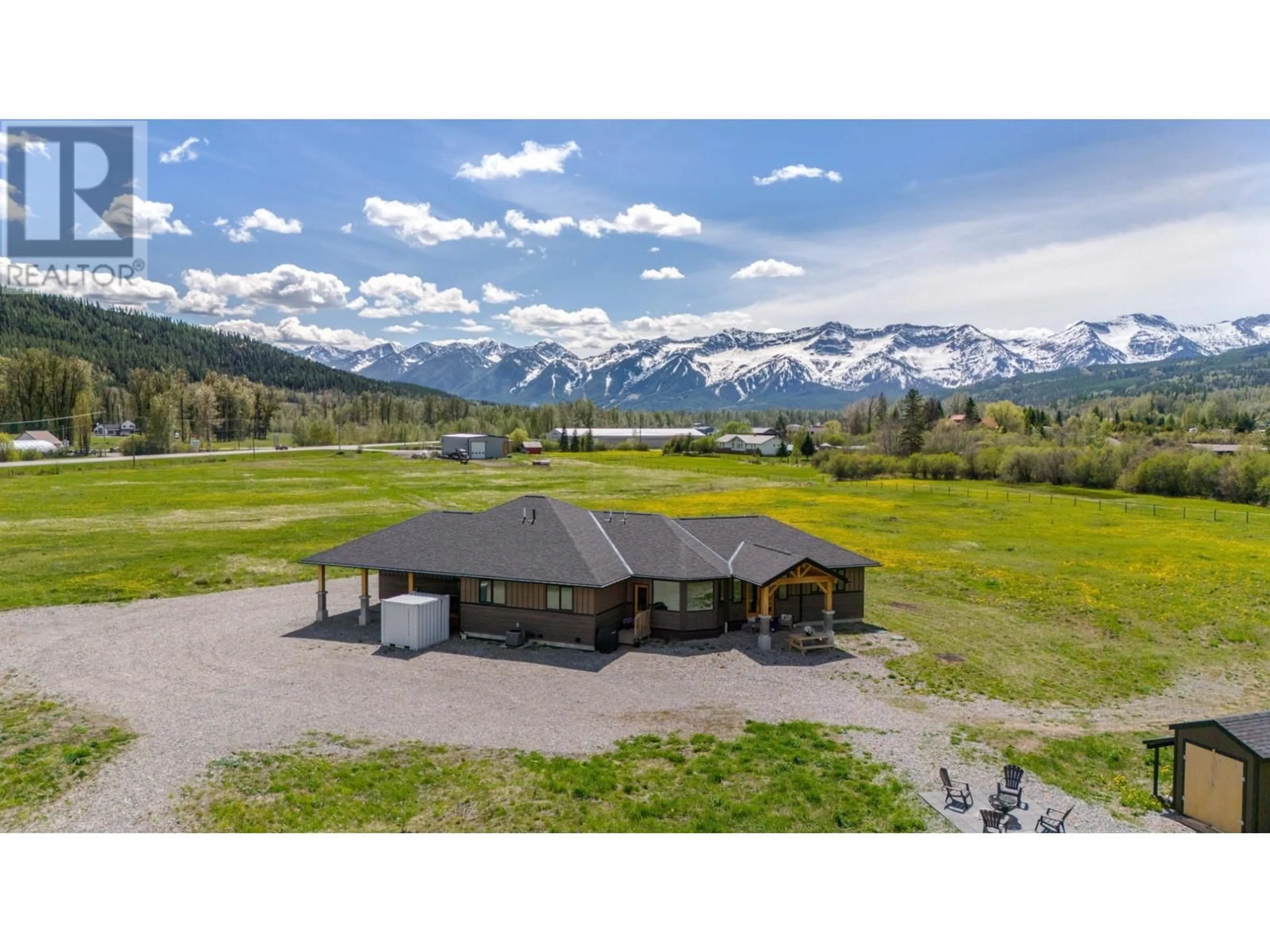 A pic from outside/outdoor area/front of a property/back of a property/a pic from drone, mountain view for 6385 3 HIGHWAY, Fernie British Columbia V0B1M0