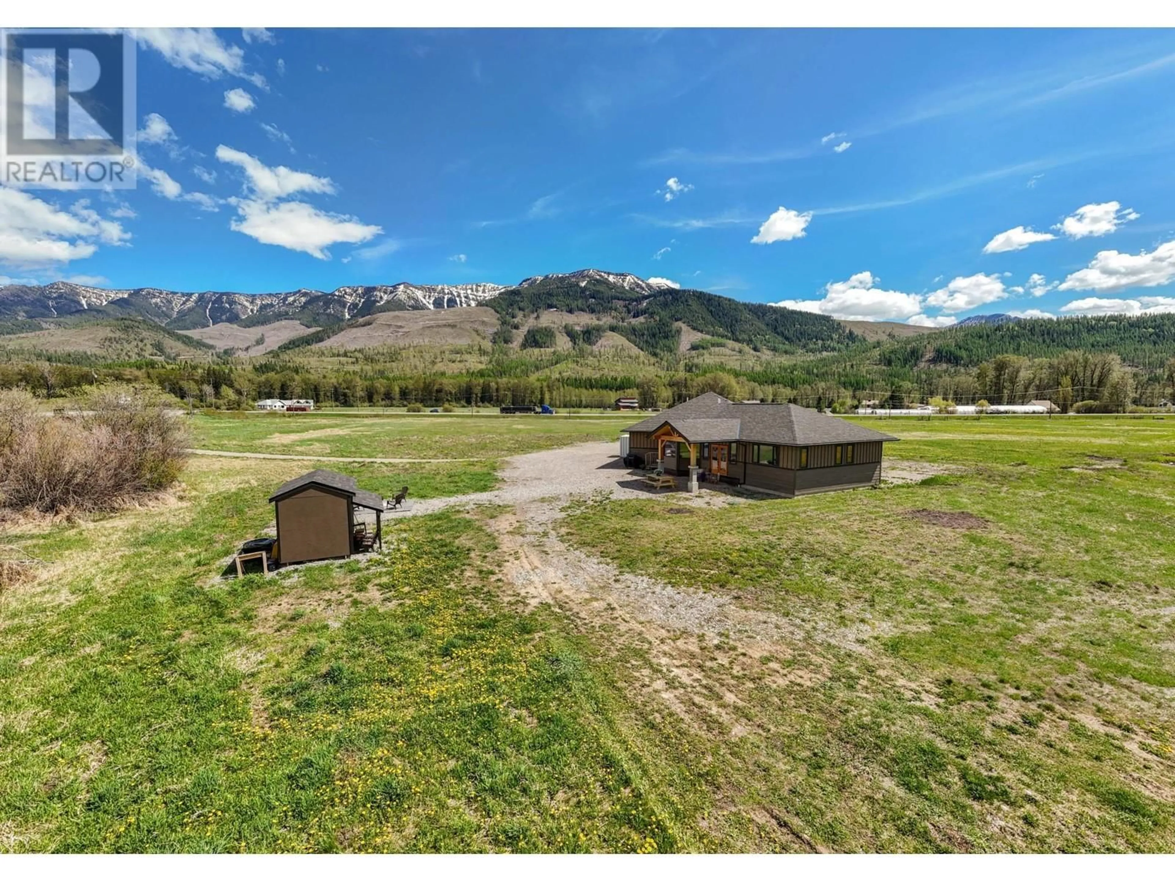 A pic from outside/outdoor area/front of a property/back of a property/a pic from drone, mountain view for 6385 3 HIGHWAY, Fernie British Columbia V0B1M0