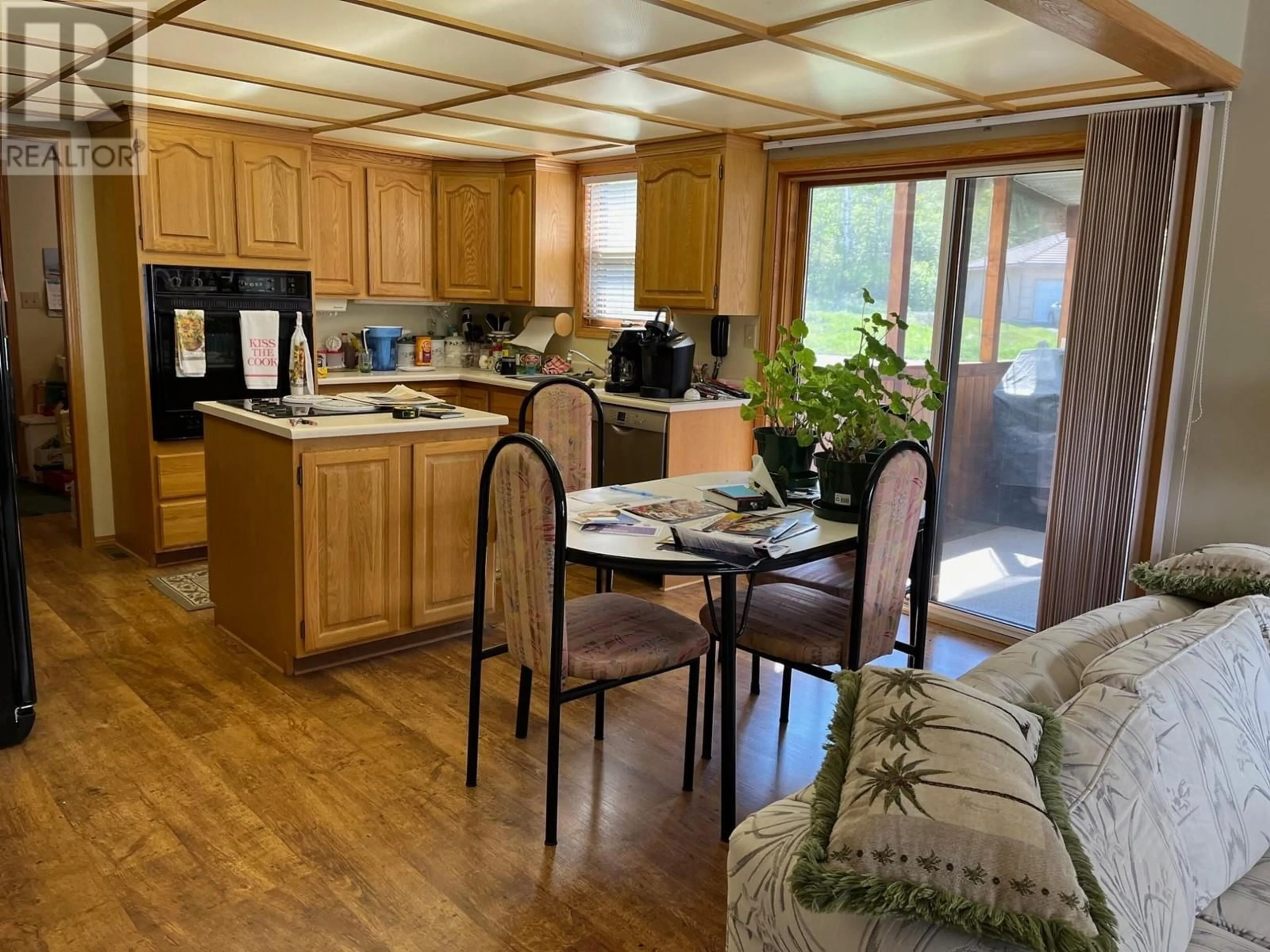 Open concept kitchen, wood/laminate floor for 5121 RIVERVIEW CRESCENT, Fairmont Hot Springs British Columbia V0B1L1