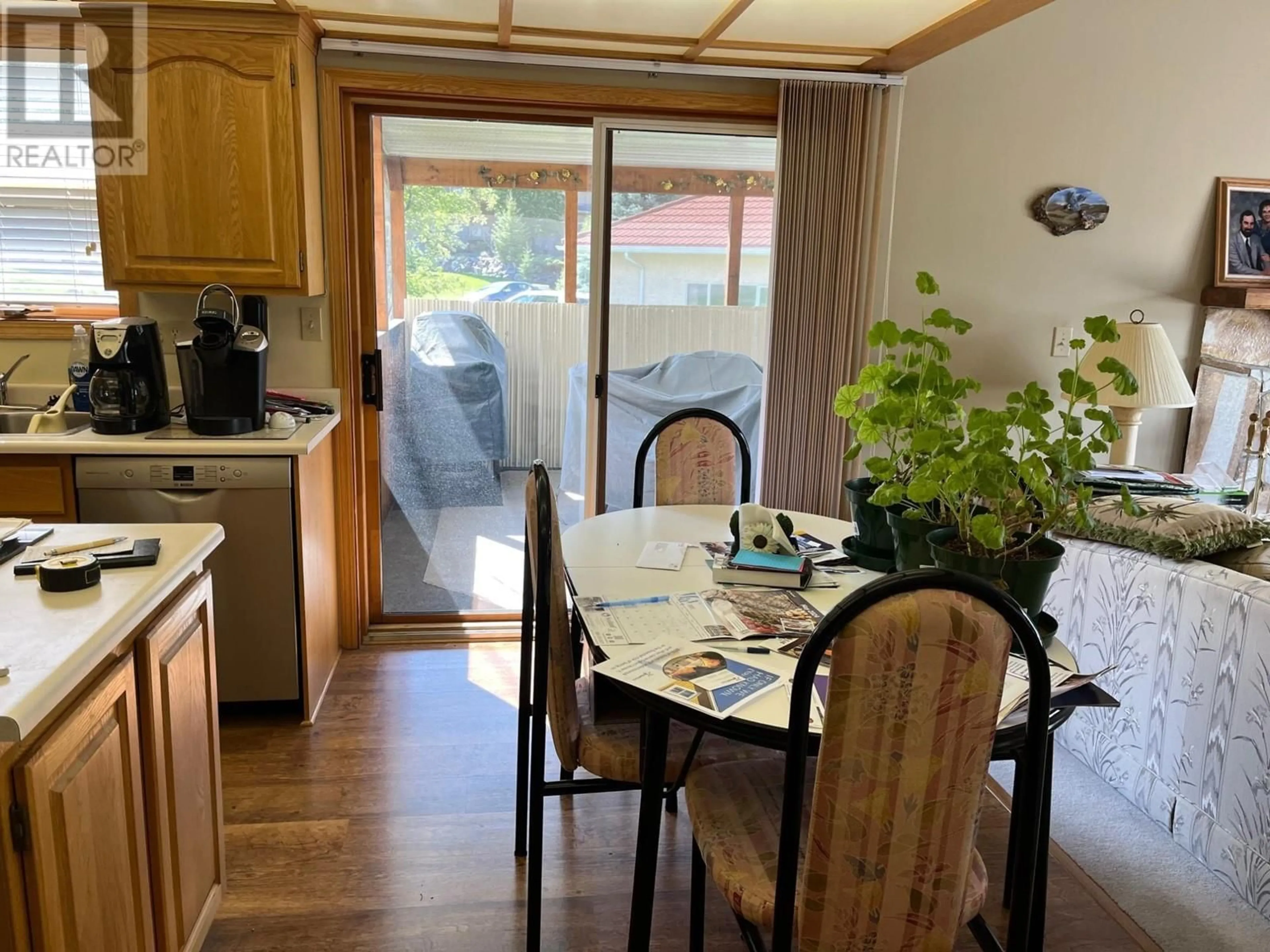 Dining room, wood/laminate floor for 5121 RIVERVIEW CRESCENT, Fairmont Hot Springs British Columbia V0B1L1