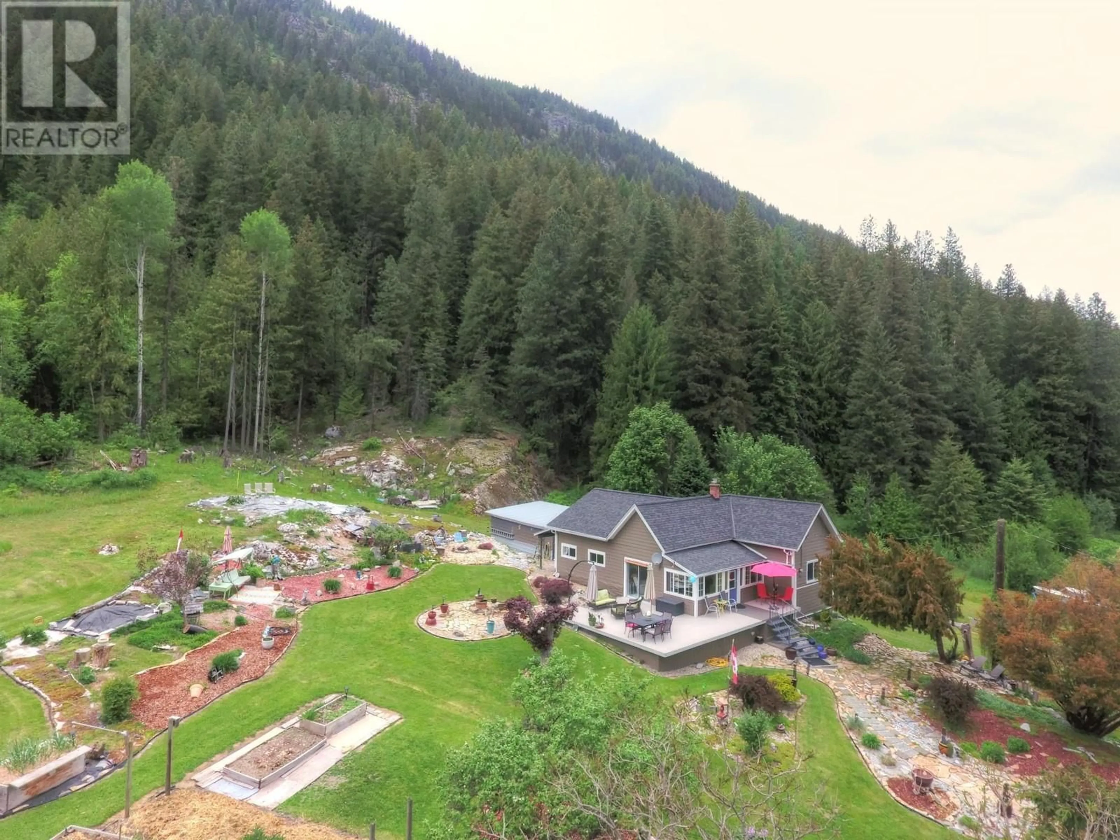 A pic from outside/outdoor area/front of a property/back of a property/a pic from drone, mountain view for 1753 3A HIGHWAY, Castlegar British Columbia V1N4R8