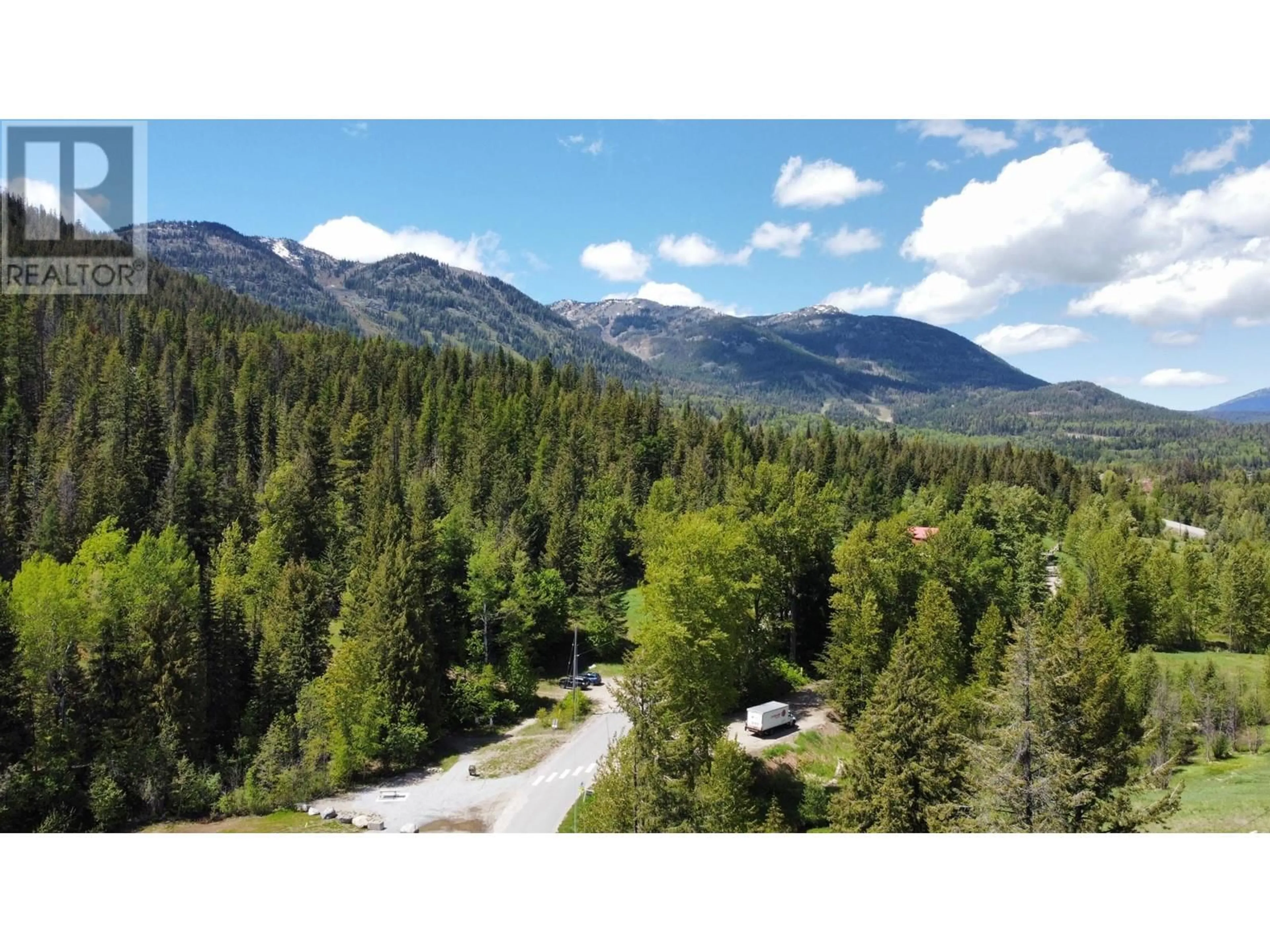 A pic from outside/outdoor area/front of a property/back of a property/a pic from drone, forest/trees view for 3915 OLD RED MOUNTAIN ROAD, Rossland British Columbia V0G1Y0