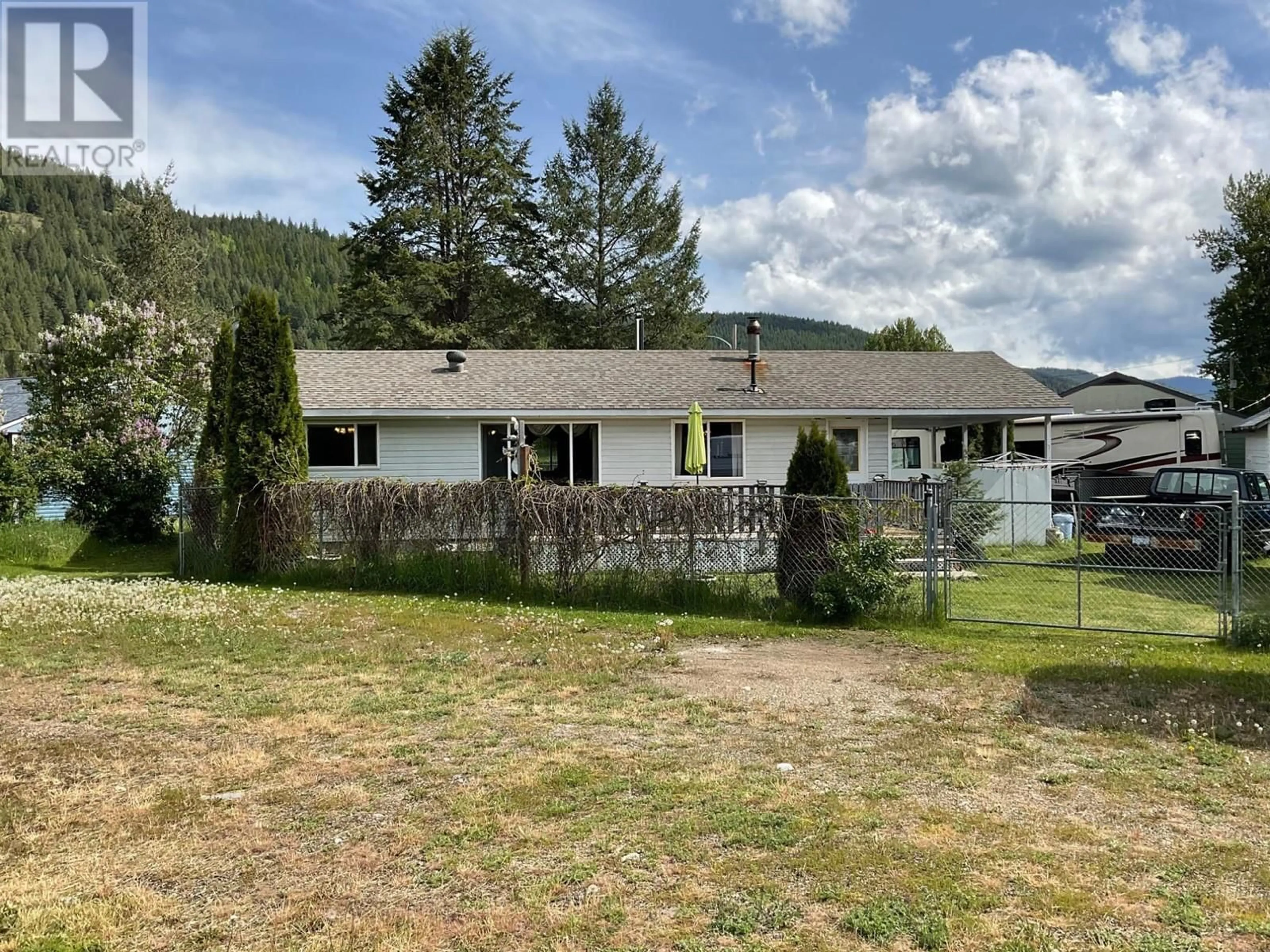 A pic from outside/outdoor area/front of a property/back of a property/a pic from drone, mountain view for 502 WOODGREEN CRESCENT, Greenwood British Columbia V0H1J0