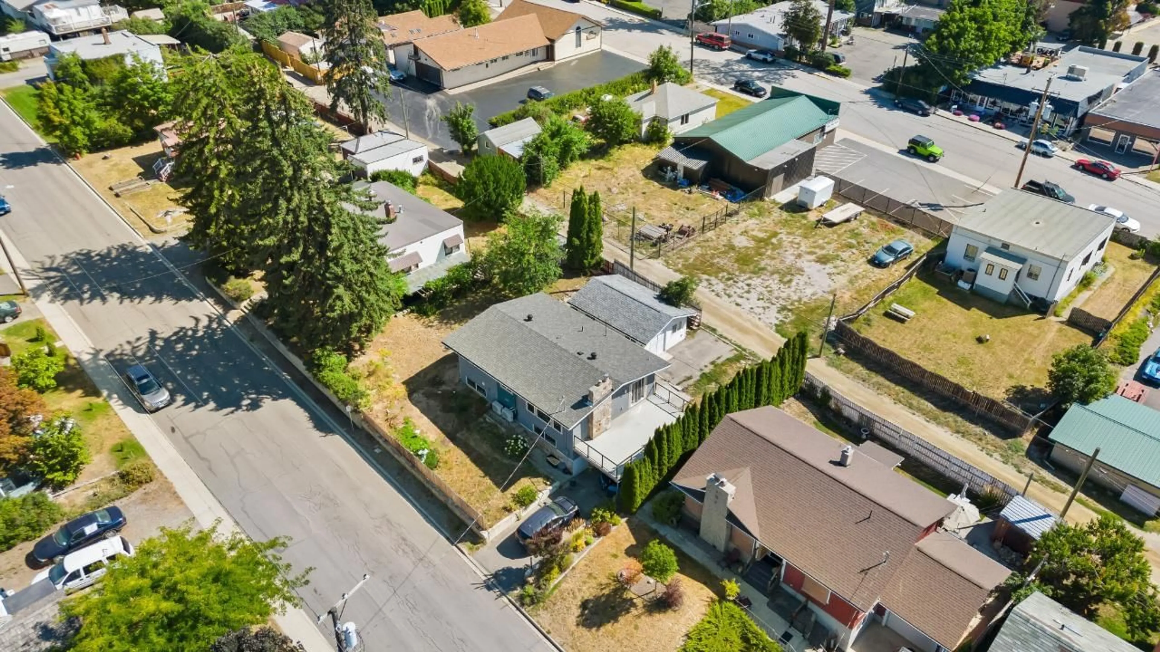 Frontside or backside of a home, the fenced backyard for 132 14TH  N Avenue, Creston British Columbia V0B1G0