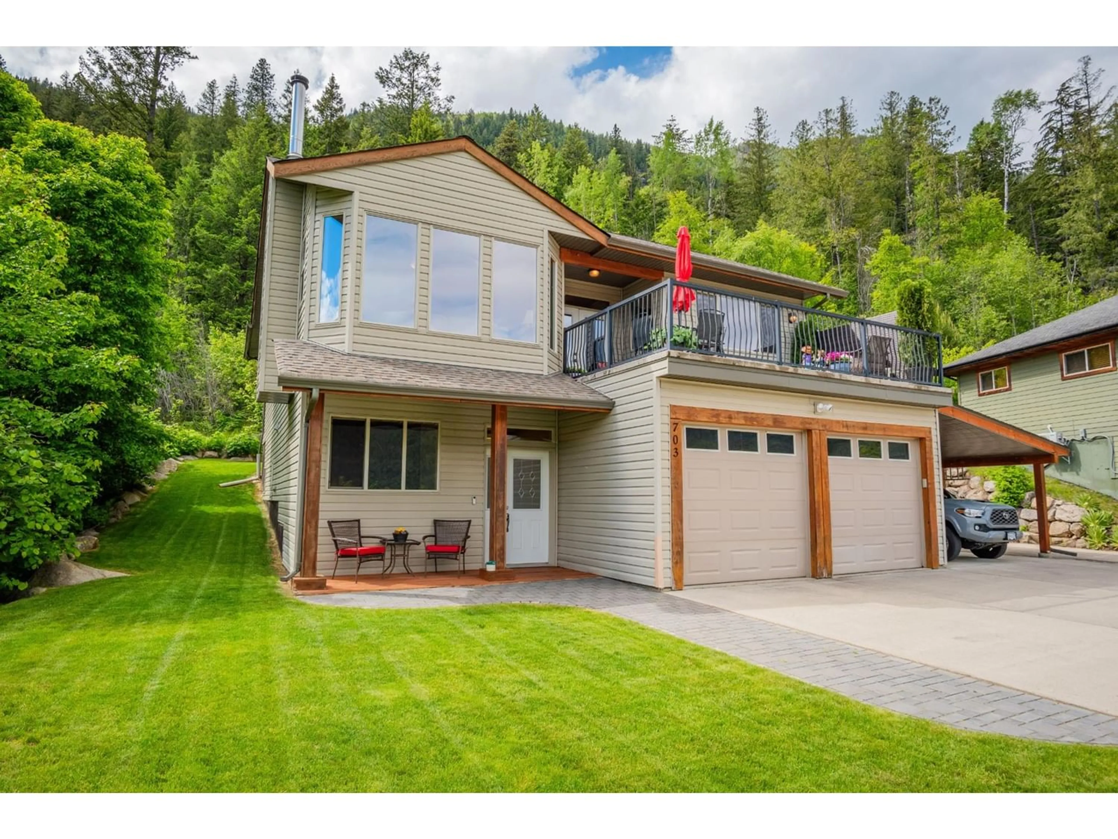 Frontside or backside of a home for 703 STROMME LANE, Nelson British Columbia V1L6H7