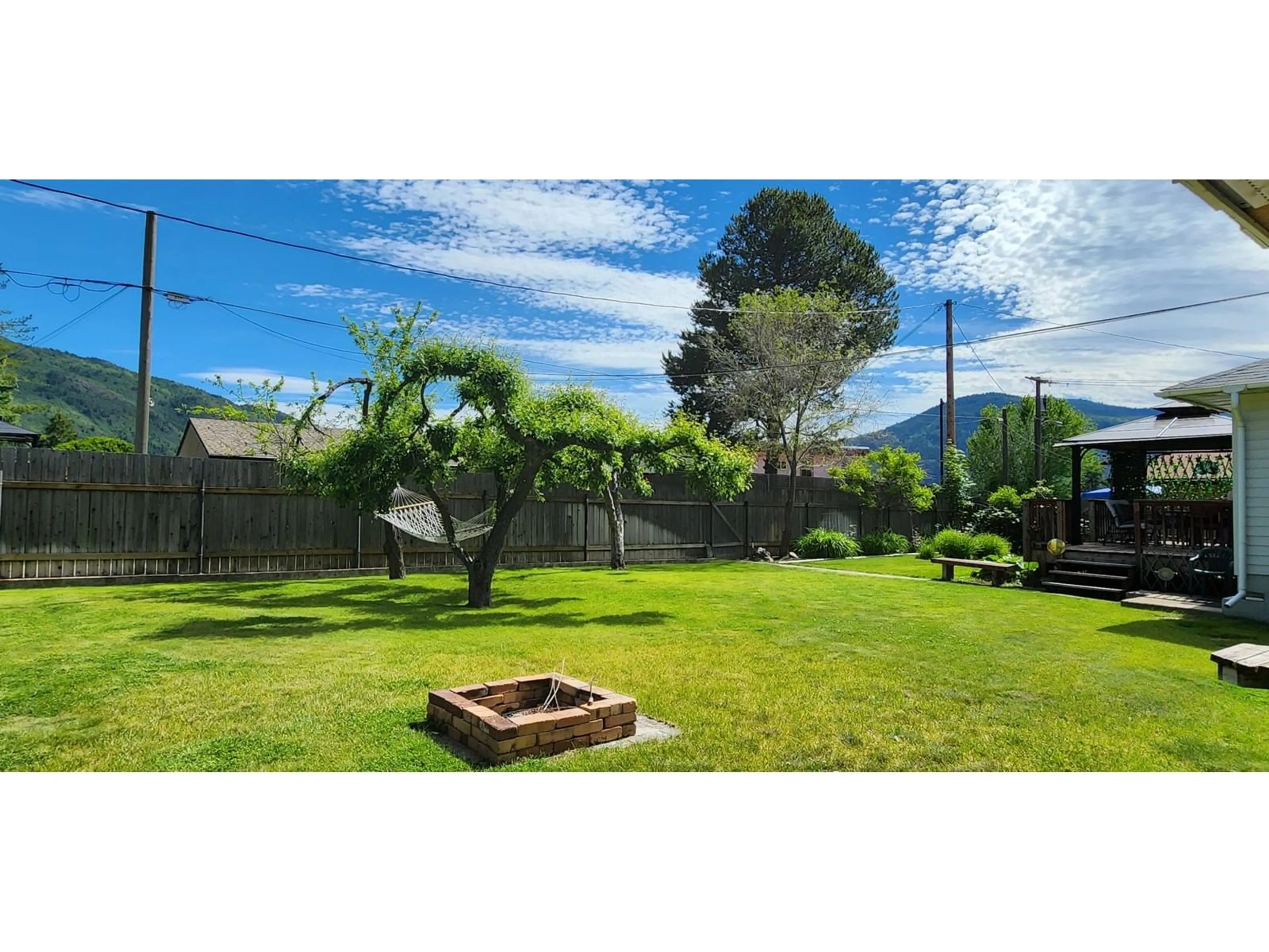 Patio, the fenced backyard for 215 9TH Avenue, Montrose British Columbia V0G1P0