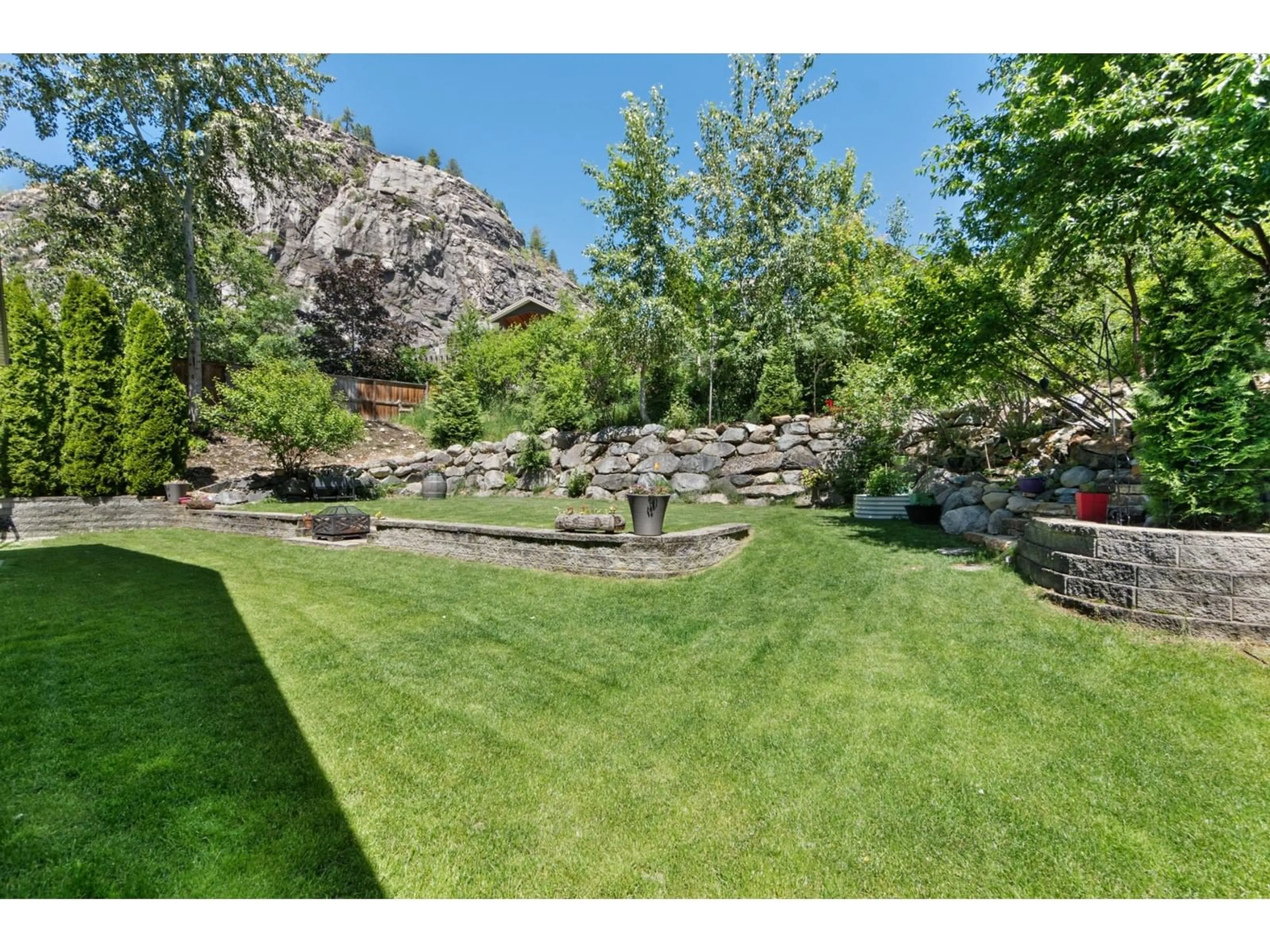 Patio, the fenced backyard for 1371 37TH Street, Castlegar British Columbia V1N3N2