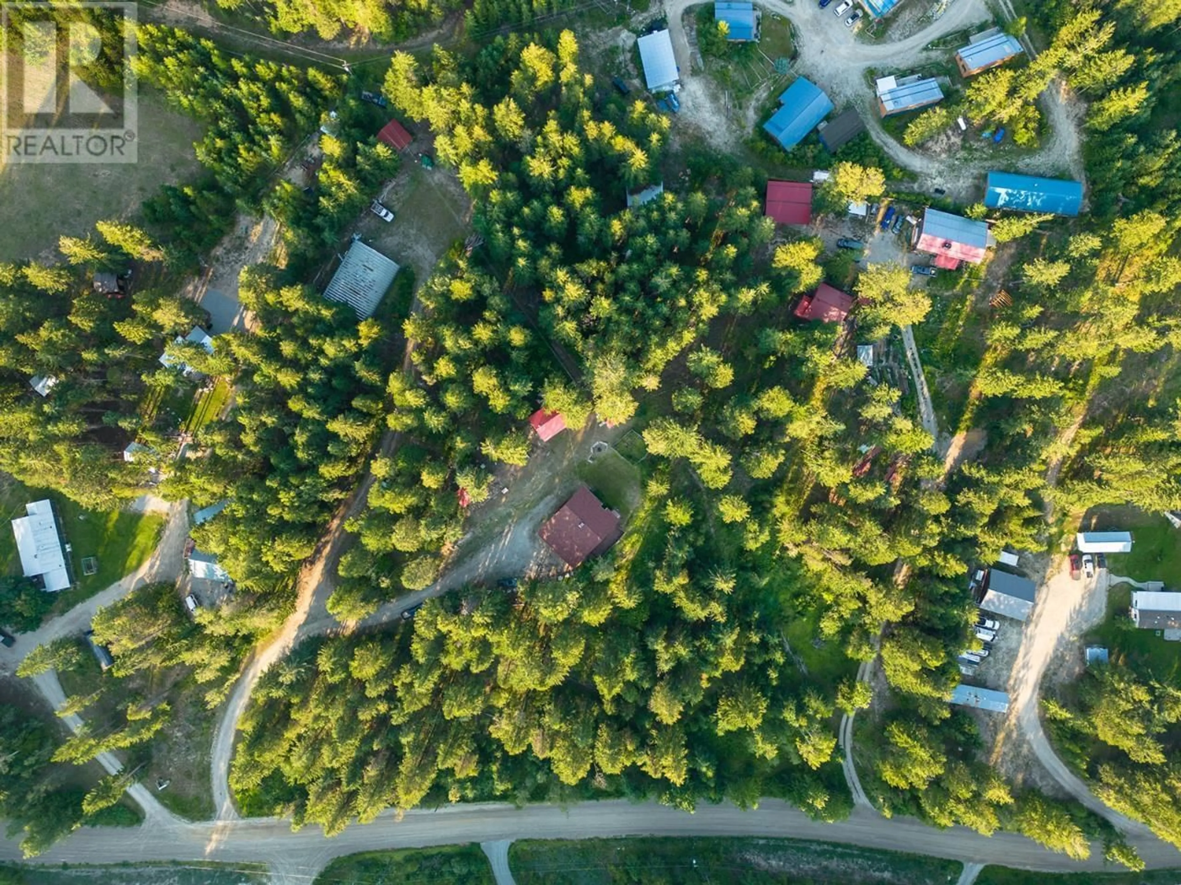 A pic from outside/outdoor area/front of a property/back of a property/a pic from drone, forest/trees view for 993 OSTER ROAD, Golden British Columbia V0A1H1