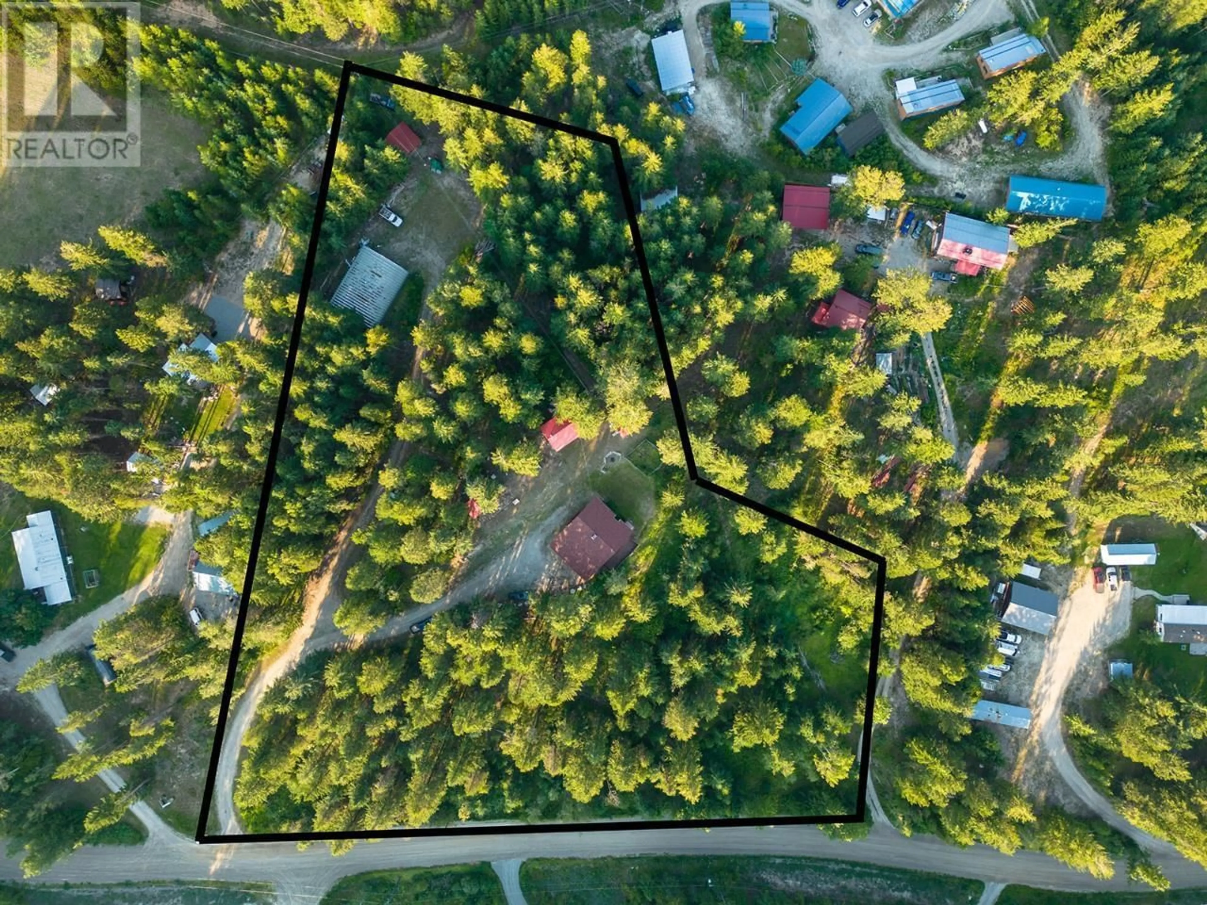 A pic from outside/outdoor area/front of a property/back of a property/a pic from drone, forest/trees view for 993 OSTER ROAD, Golden British Columbia V0A1H1