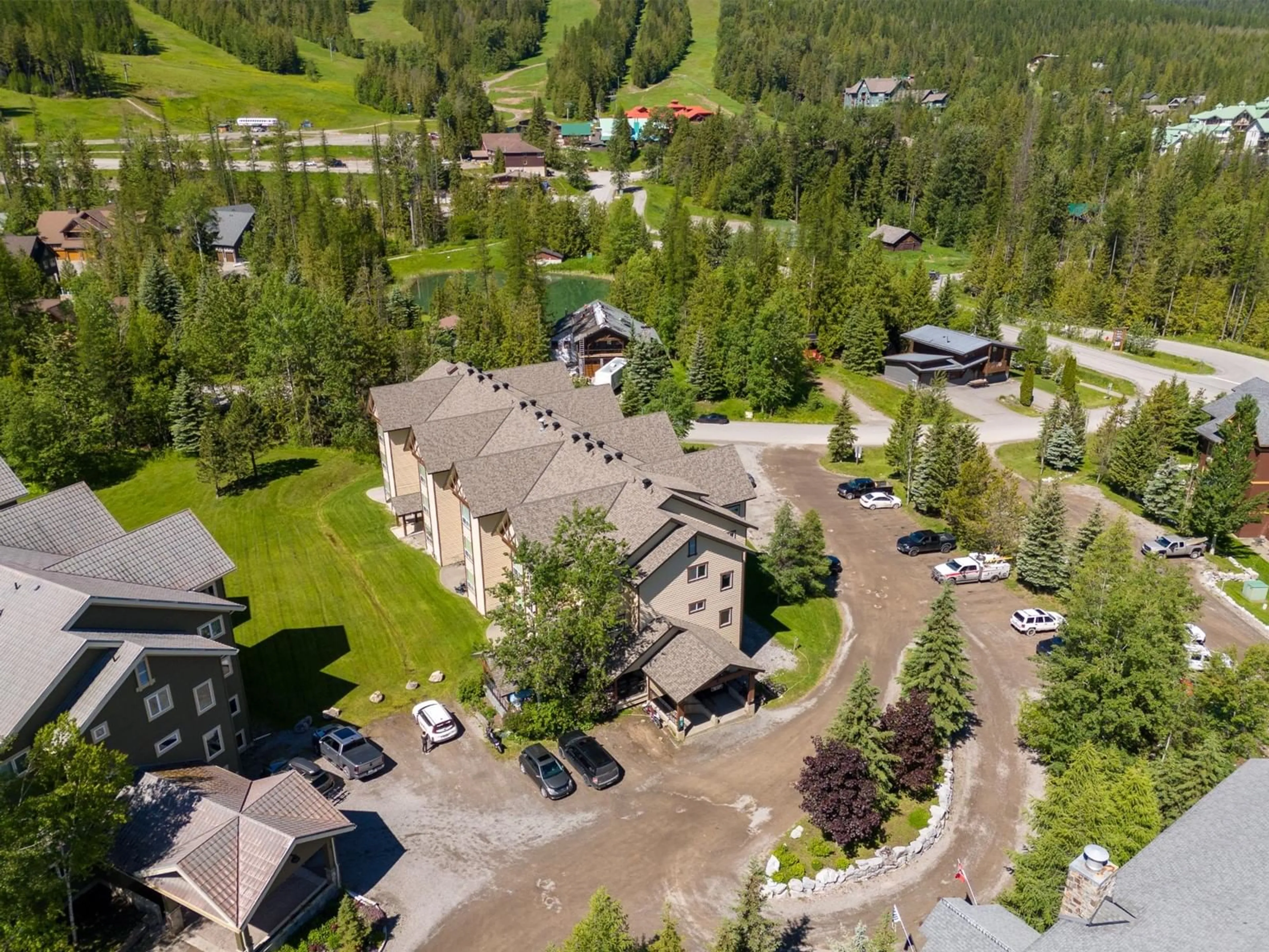 A pic from exterior of the house or condo, the street view for 4559 TIMBERLINE Crescent Unit# 324, Fernie British Columbia V0B1M7