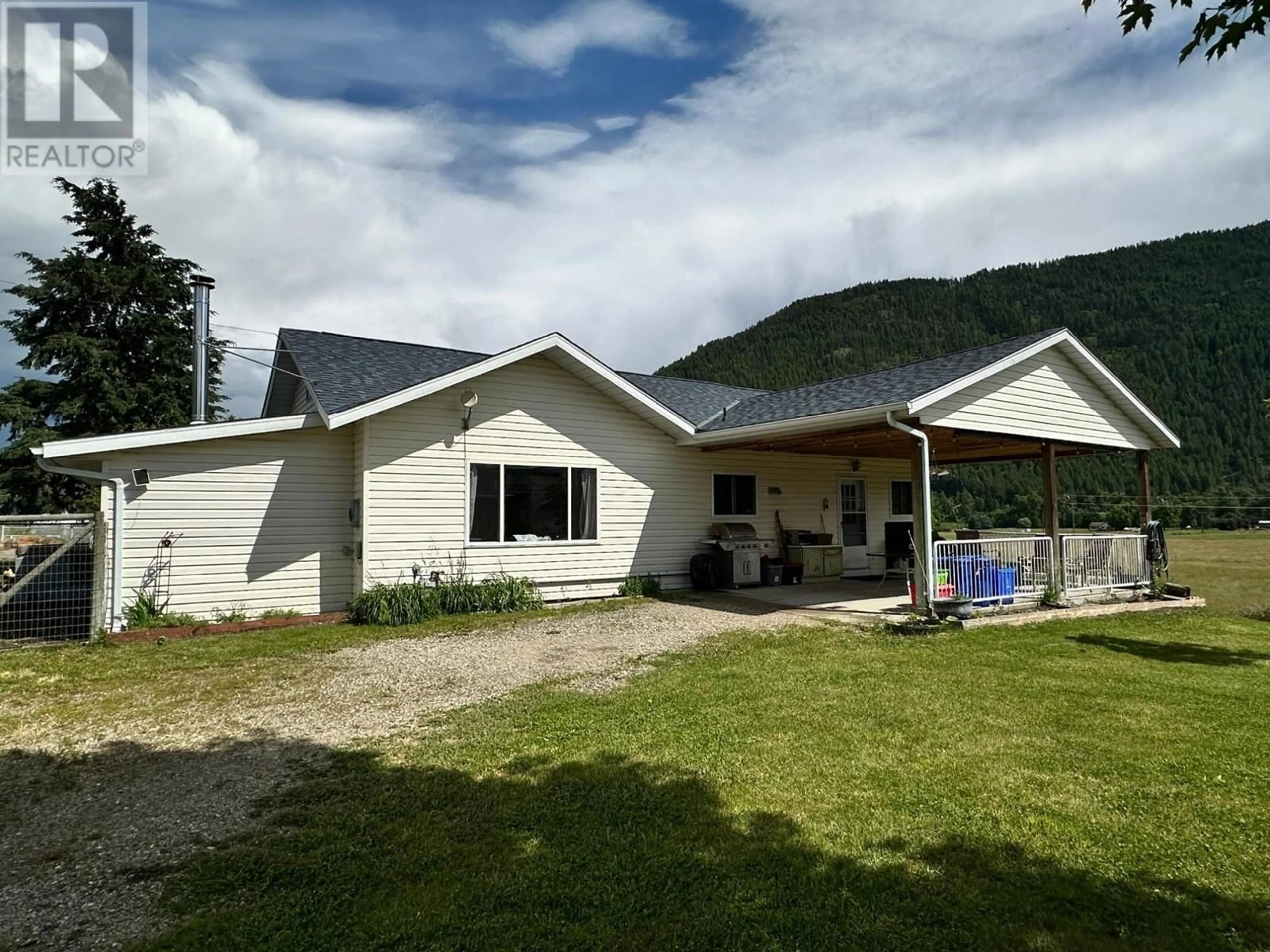 A pic from outside/outdoor area/front of a property/back of a property/a pic from drone, mountain view for 430 ATWOOD ROAD, Grand Forks British Columbia V0H1H9