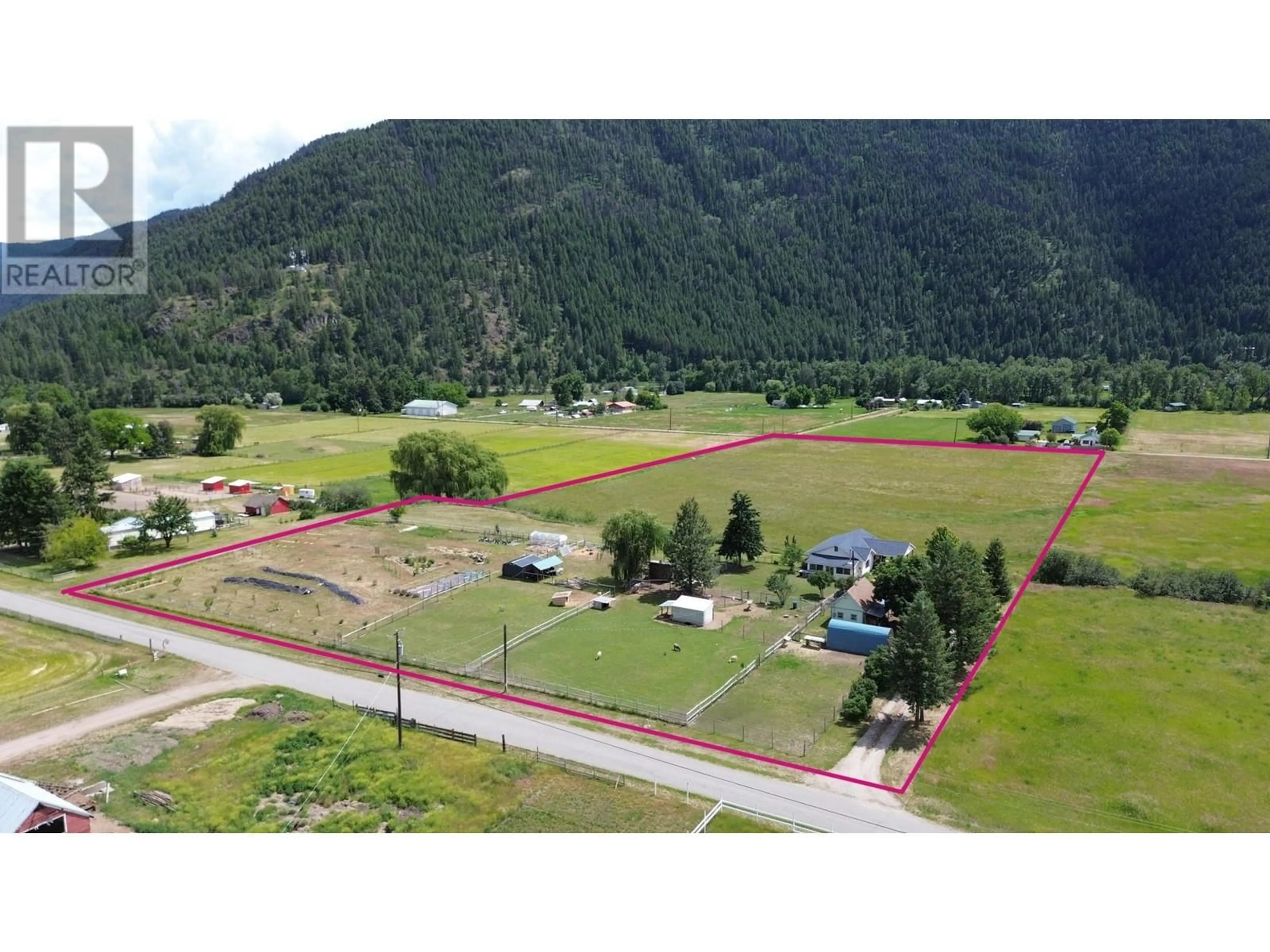 A pic from outside/outdoor area/front of a property/back of a property/a pic from drone, mountain view for 430 ATWOOD ROAD, Grand Forks British Columbia V0H1H9