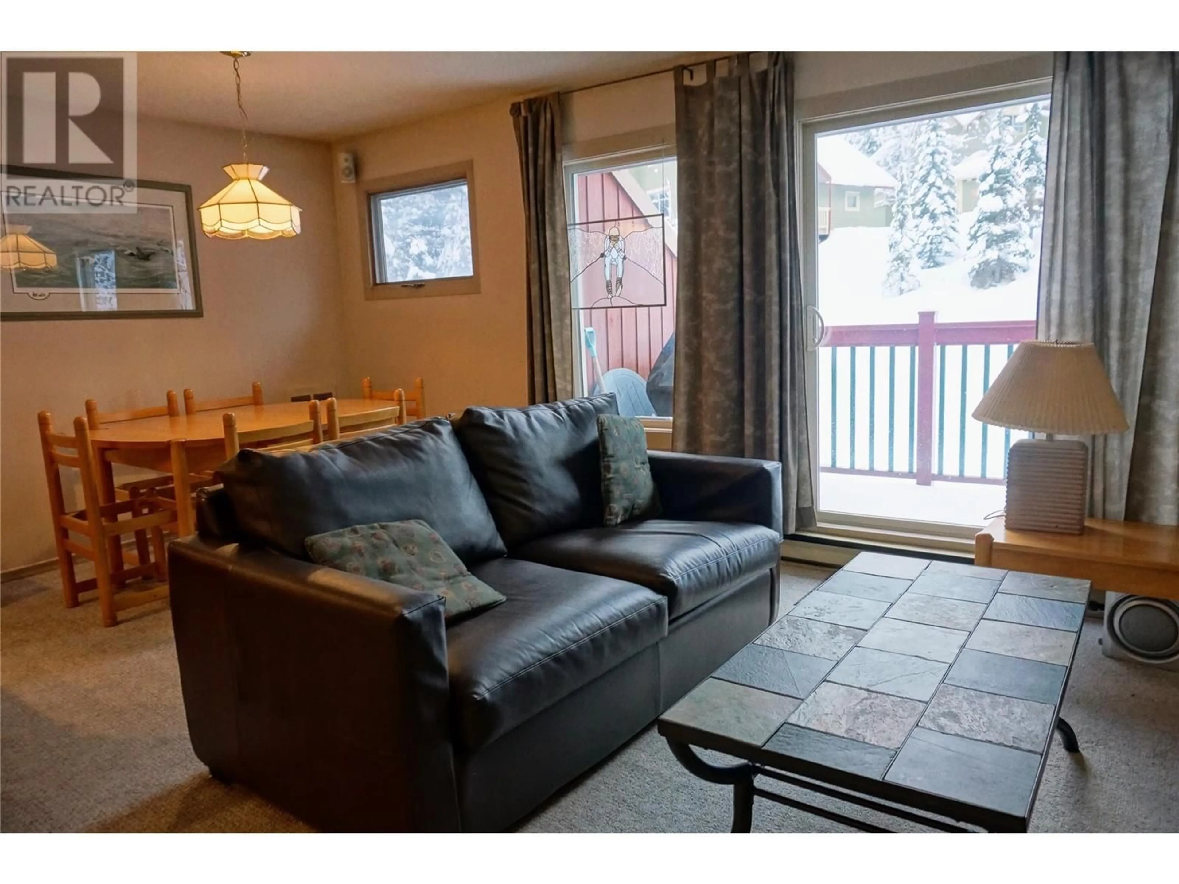 Living room with furniture, wood/laminate floor for 1007 - 2030 PANORAMA DRIVE, Panorama British Columbia V0A1T0