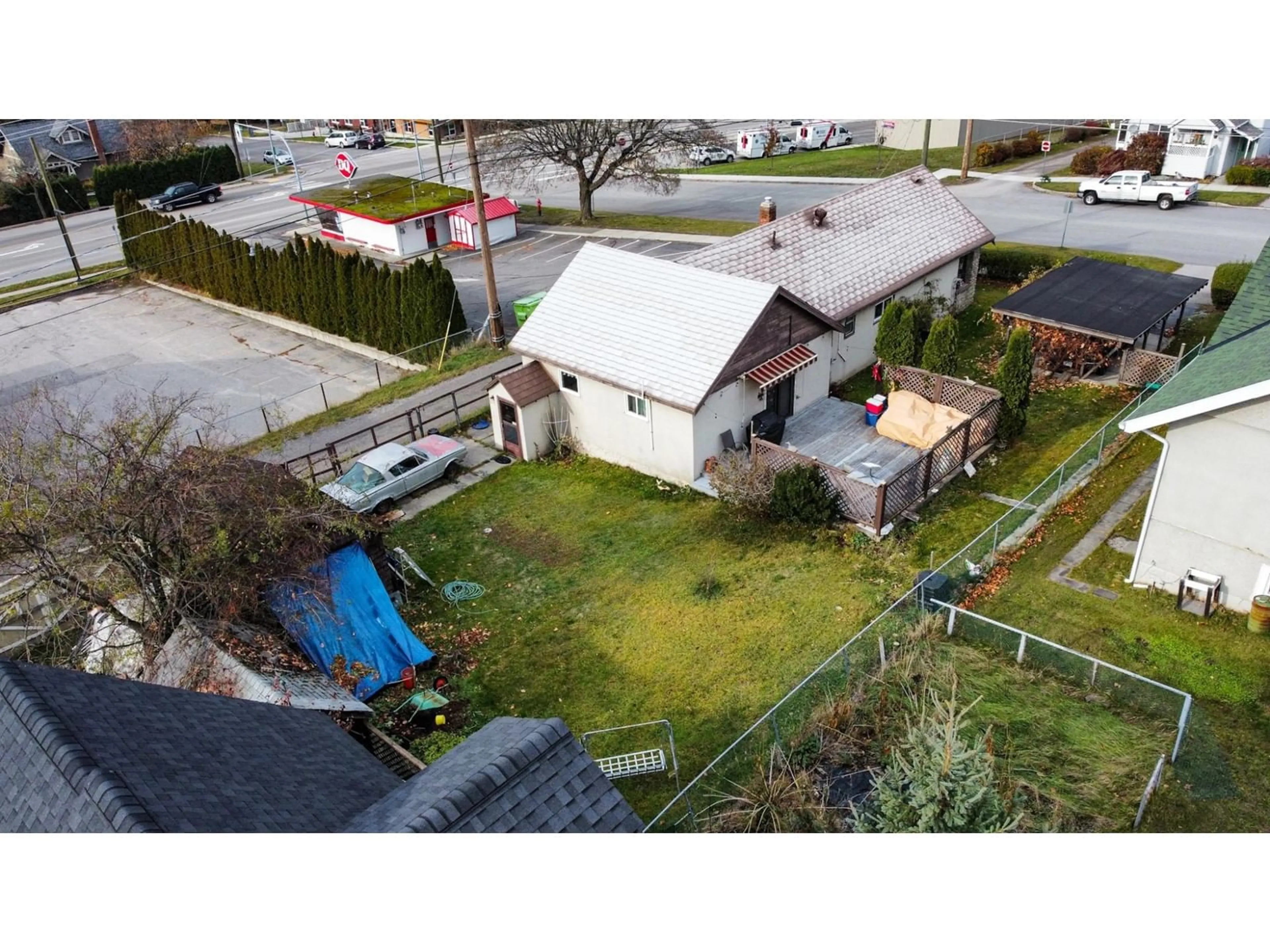 Frontside or backside of a home, the fenced backyard for 510 KOKANEE Avenue, Nelson British Columbia V1L3P1