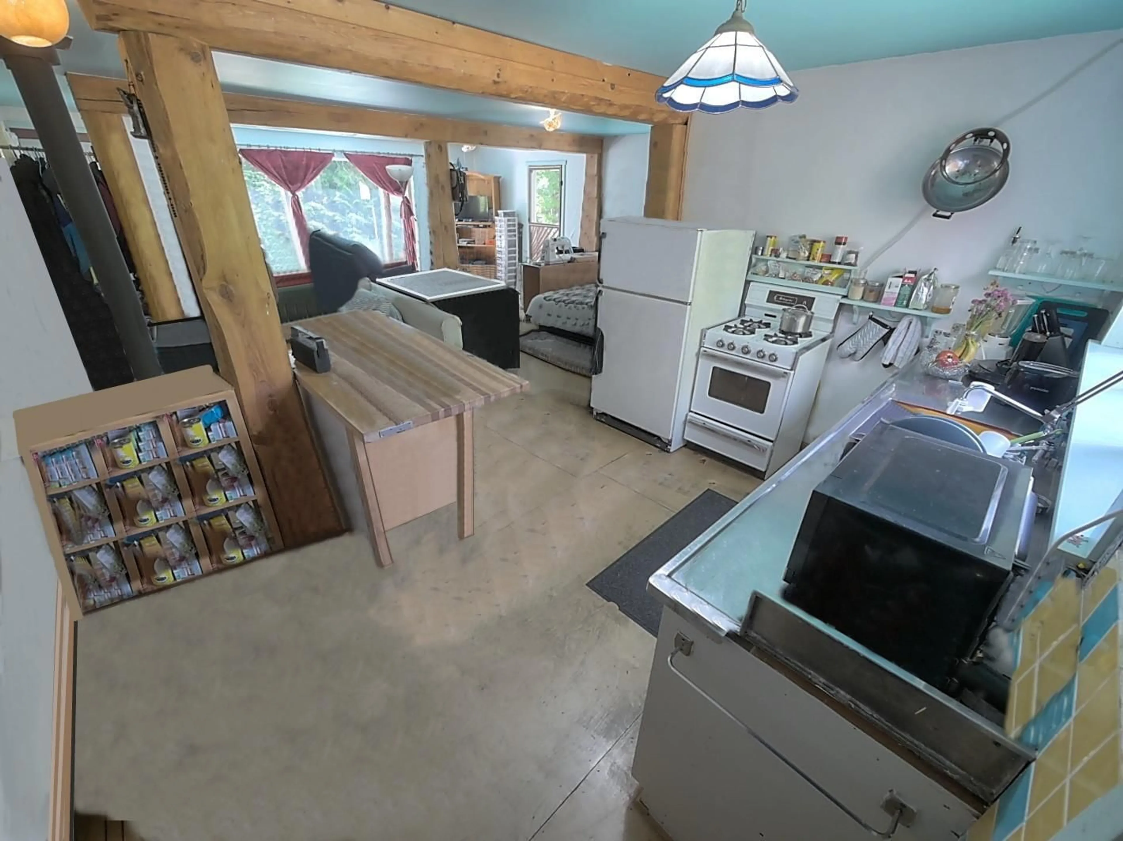 Kitchen, cement floor, cottage for 603 ARLINGTON Avenue, Slocan British Columbia V0G2C0