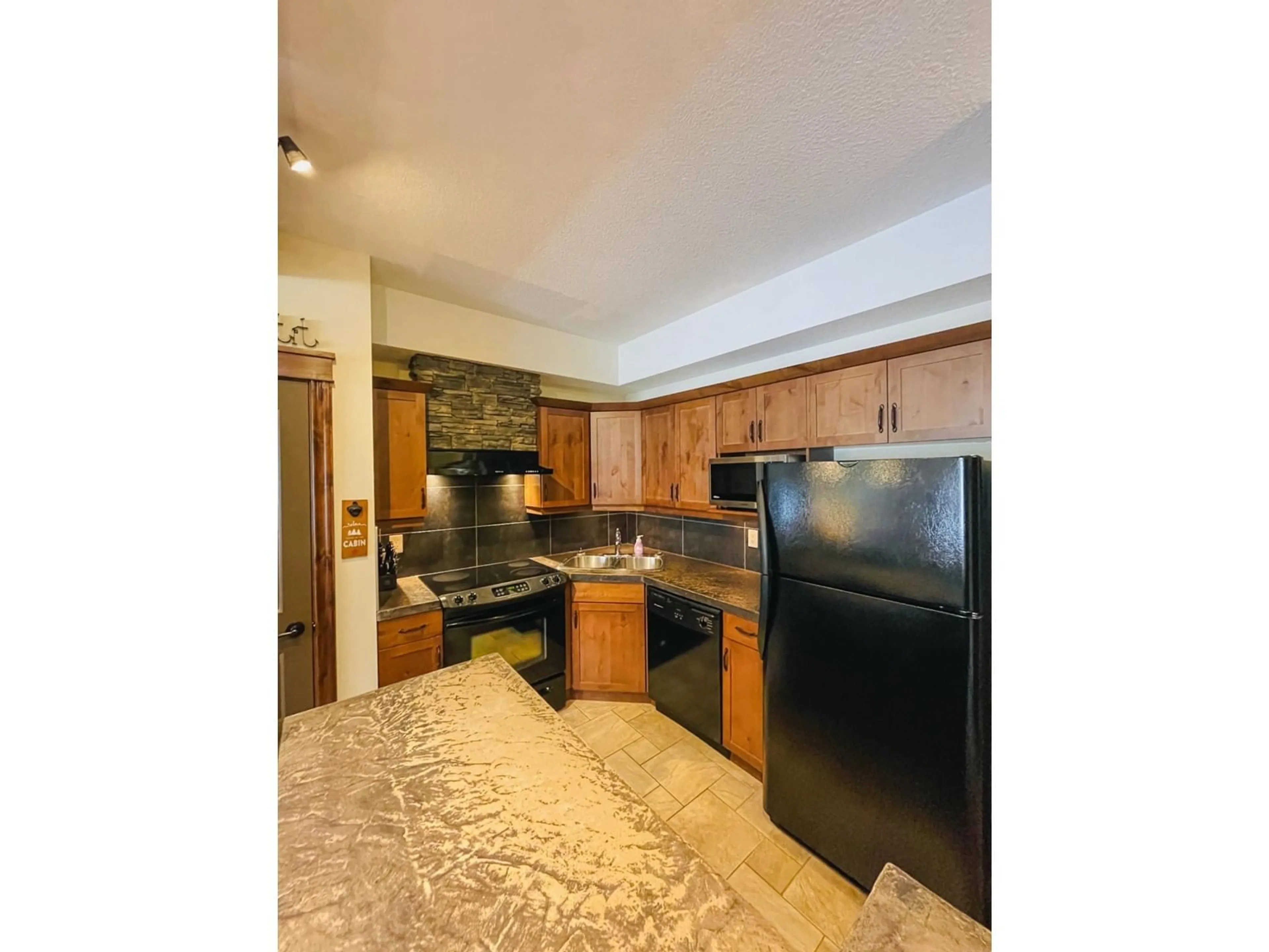 Kitchen for 1116 - 7495 COLUMBIA AVENUE, Radium Hot Springs British Columbia V0A1M0