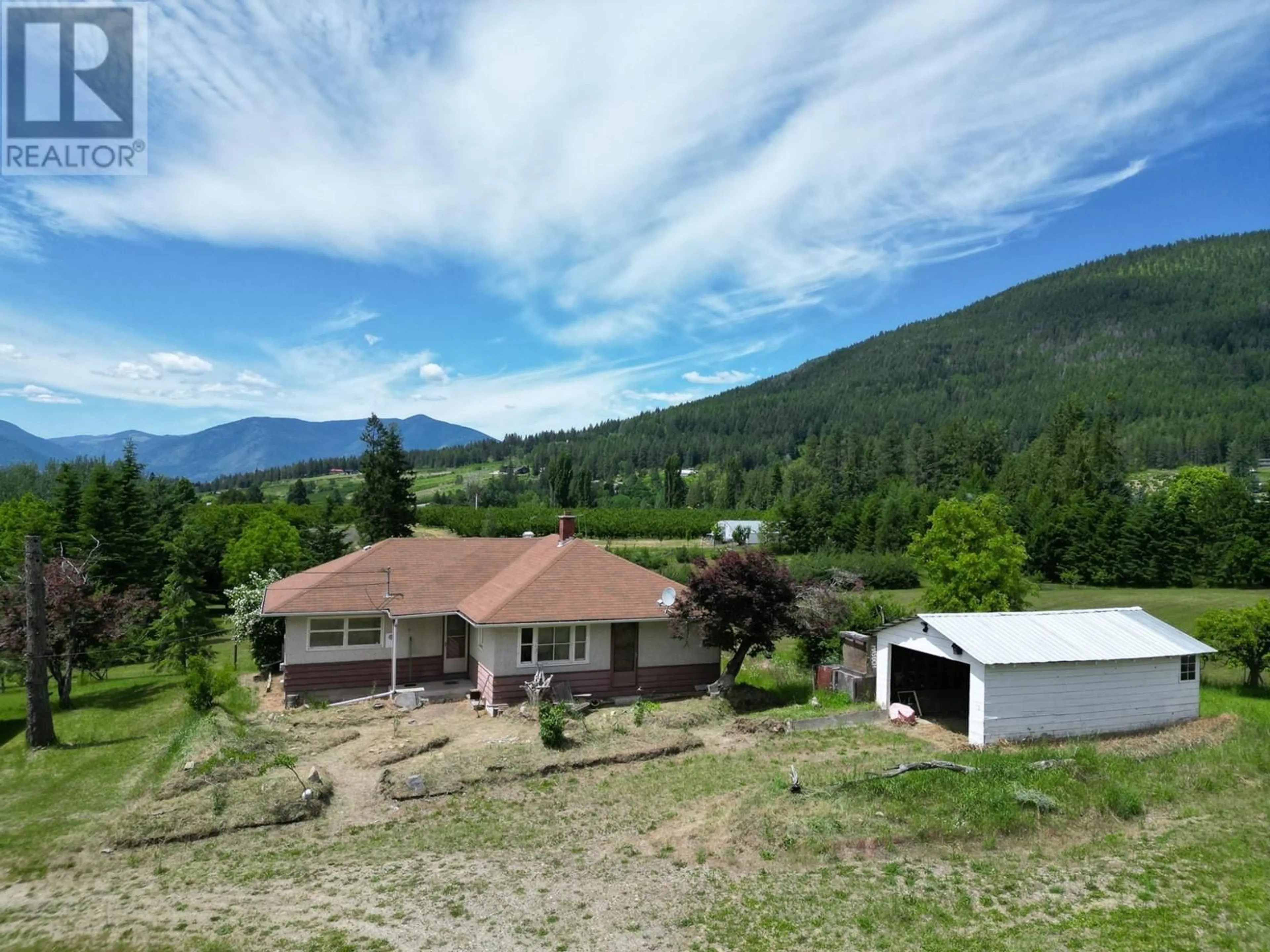 A pic from outside/outdoor area/front of a property/back of a property/a pic from drone, mountain view for 217 36TH  N AVENUE, Creston British Columbia V0B1G1