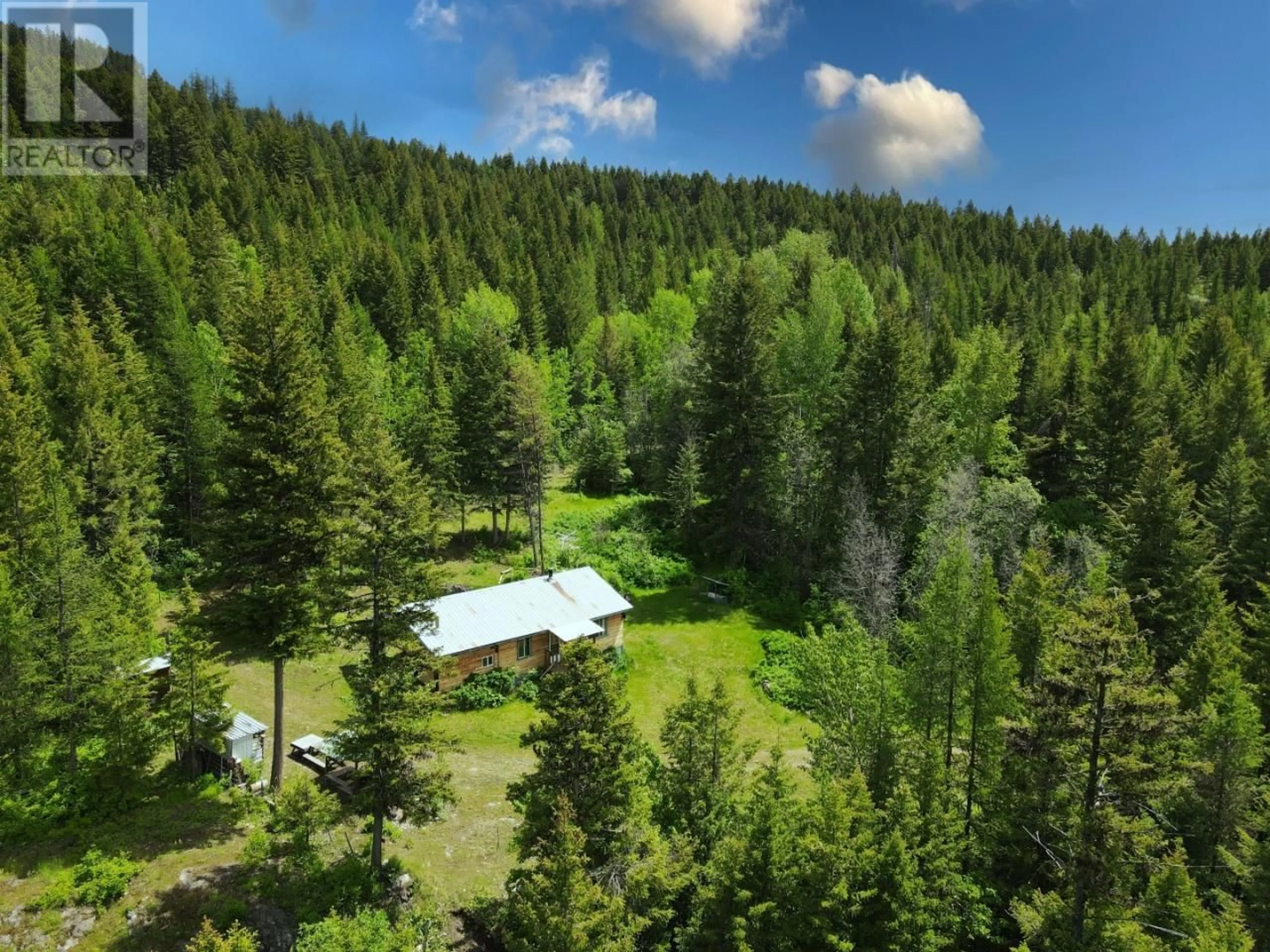 A pic from outside/outdoor area/front of a property/back of a property/a pic from drone, forest/trees view for 1740 JOLLY JACK ROAD, Greenwood British Columbia V0H1J0