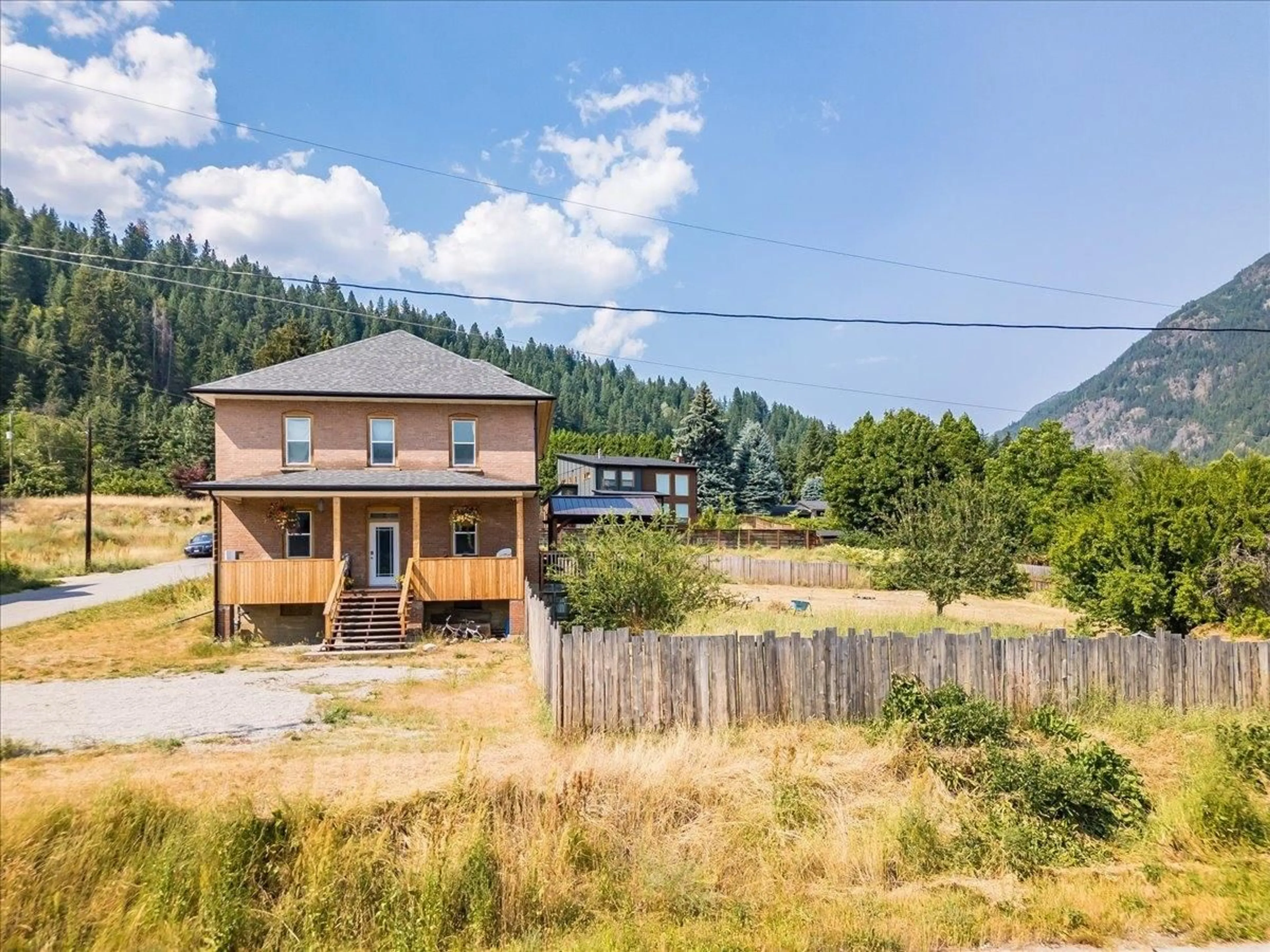 Frontside or backside of a home, cottage for 2489 PURDY Road, Robson British Columbia V1N4T9