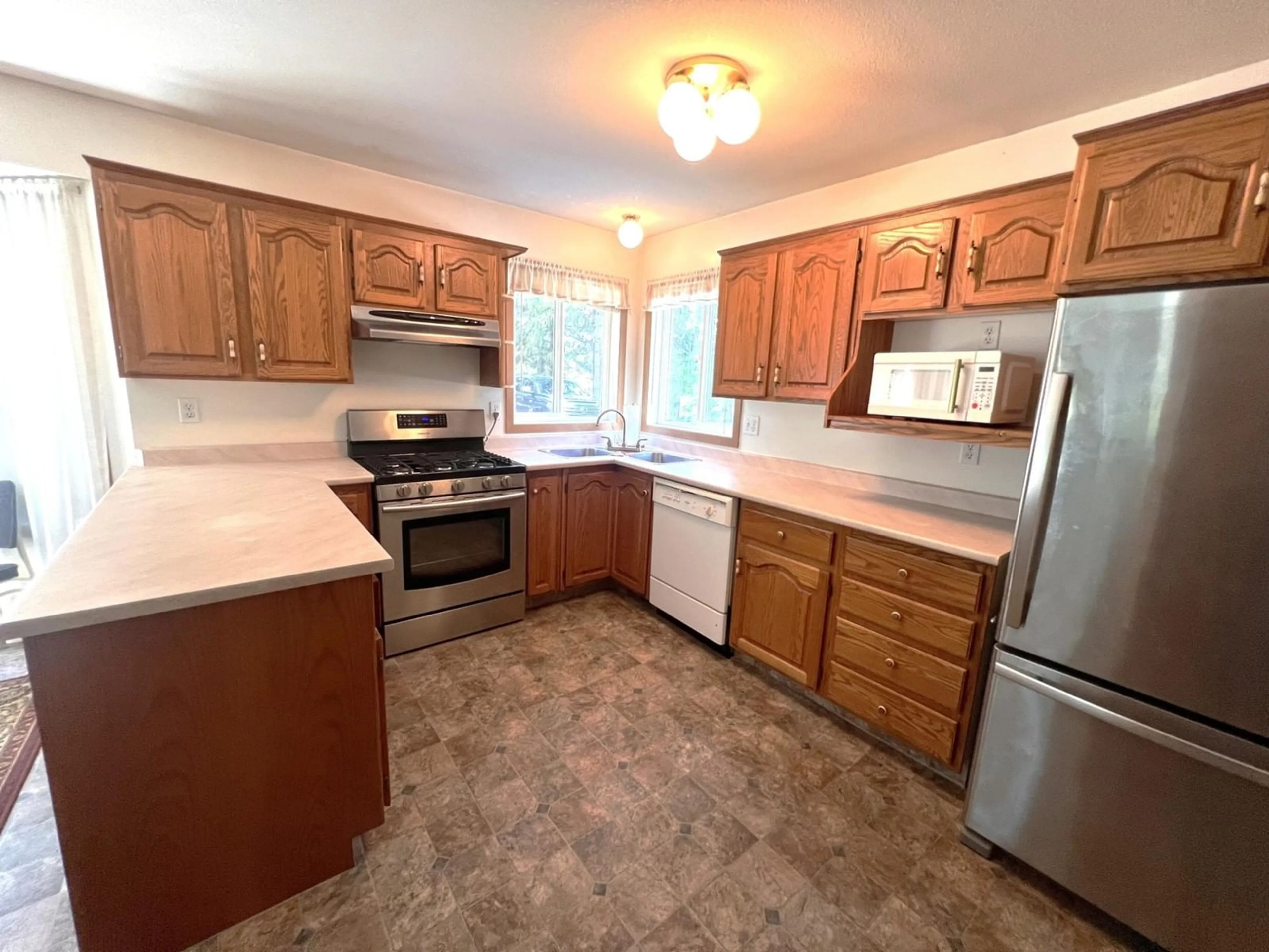 Standard kitchen, wood floors, cottage for 972 DOGWOOD Drive, South Slocan British Columbia V0G2G0