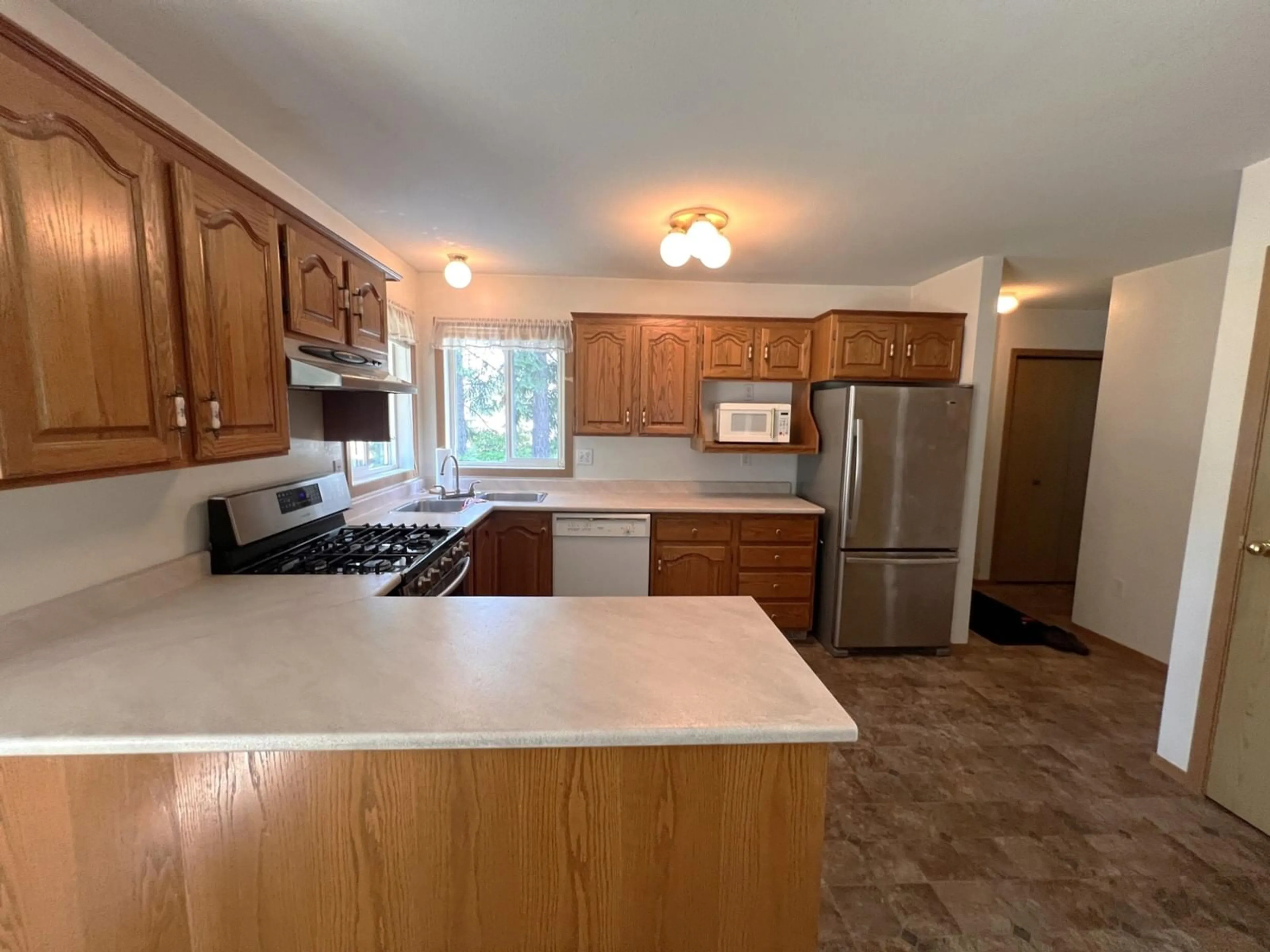 Standard kitchen, wood floors, cottage for 972 DOGWOOD Drive, South Slocan British Columbia V0G2G0