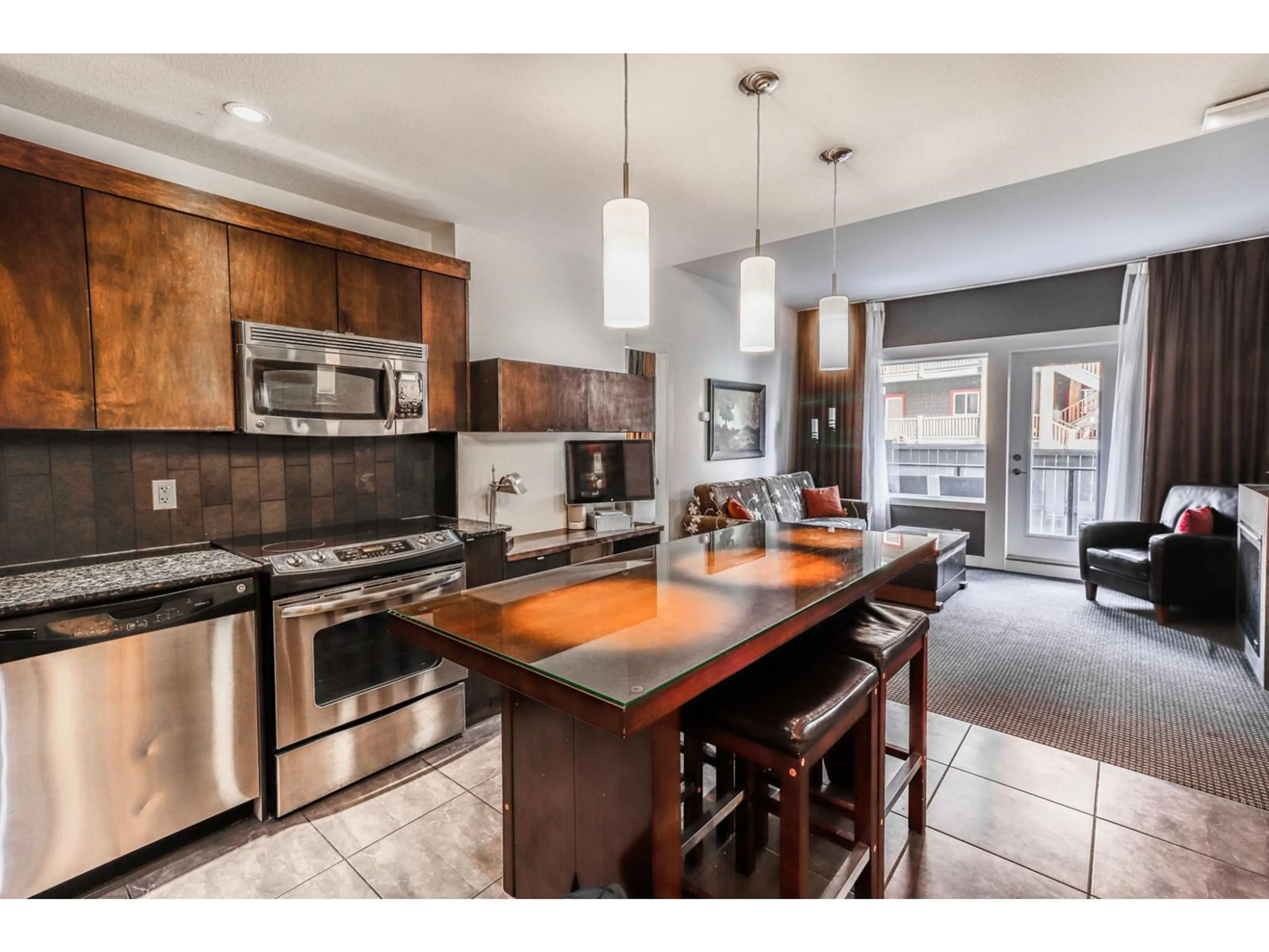 Open concept kitchen for 400 STEMWINDER Drive Unit# 105, Kimberley British Columbia V1A2Y9