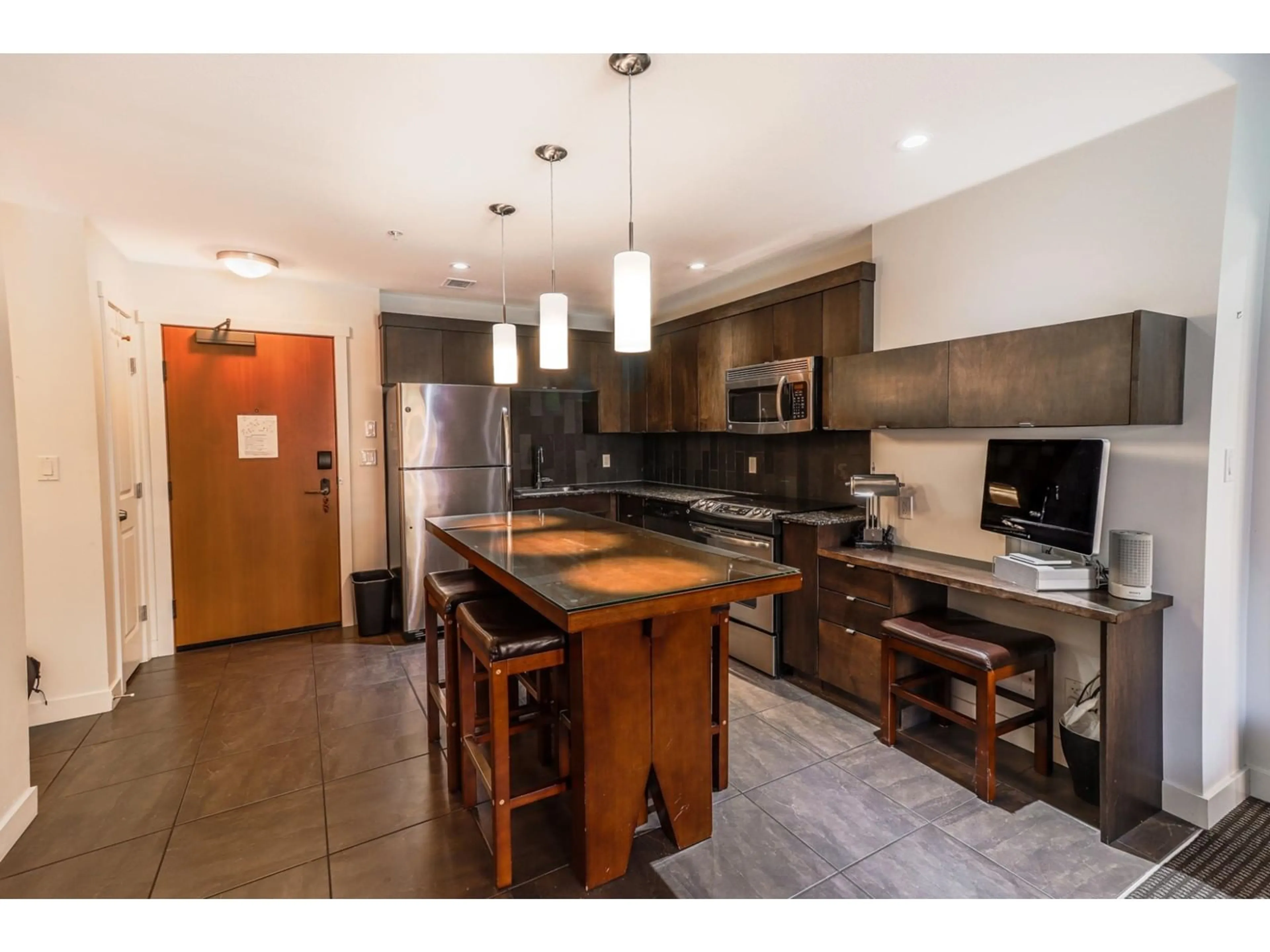 Open concept kitchen for 400 STEMWINDER Drive Unit# 105, Kimberley British Columbia V1A2Y9