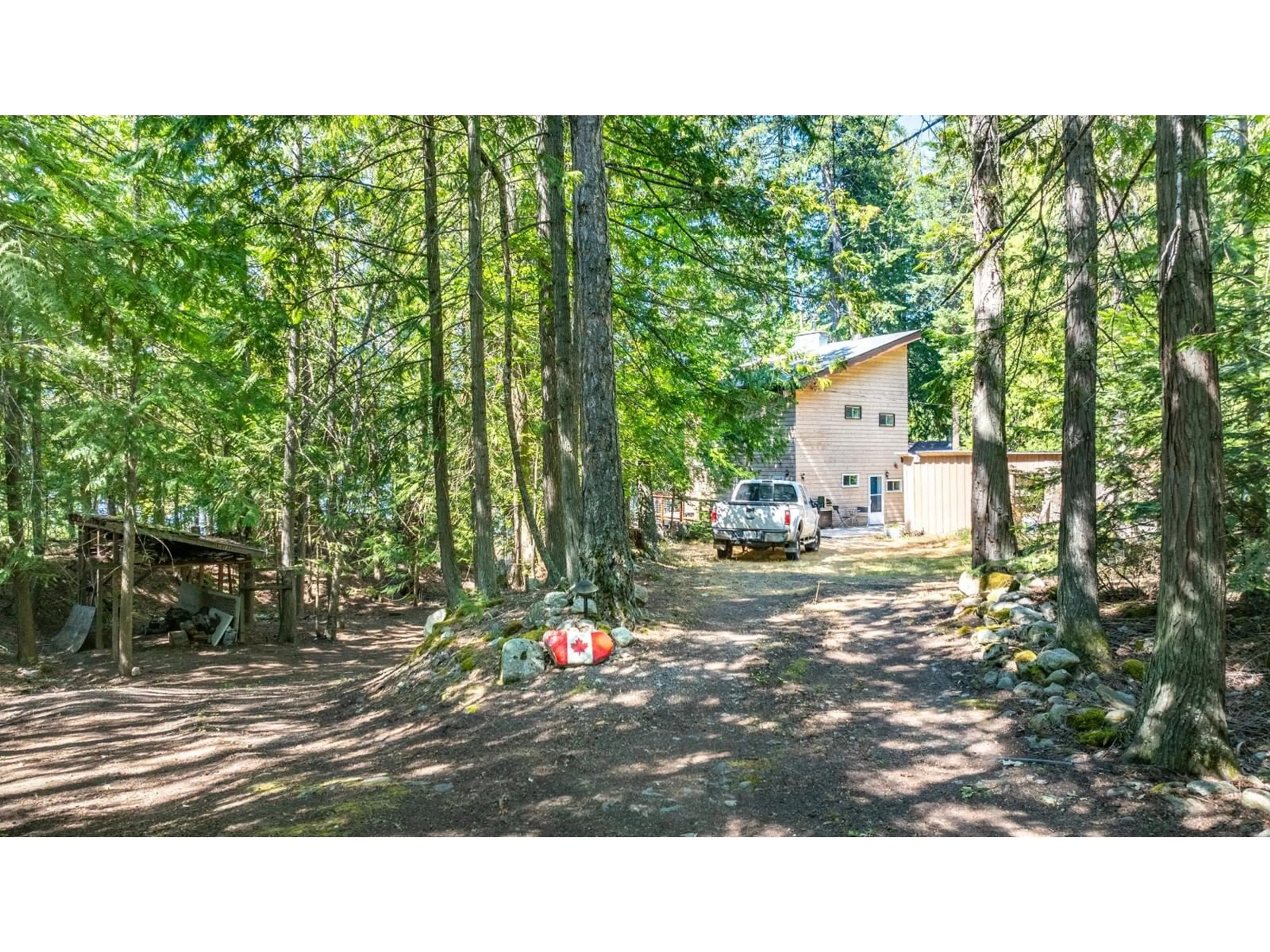 Frontside or backside of a home, the fenced backyard for 13507 3A Highway, Boswell British Columbia V0B1A0