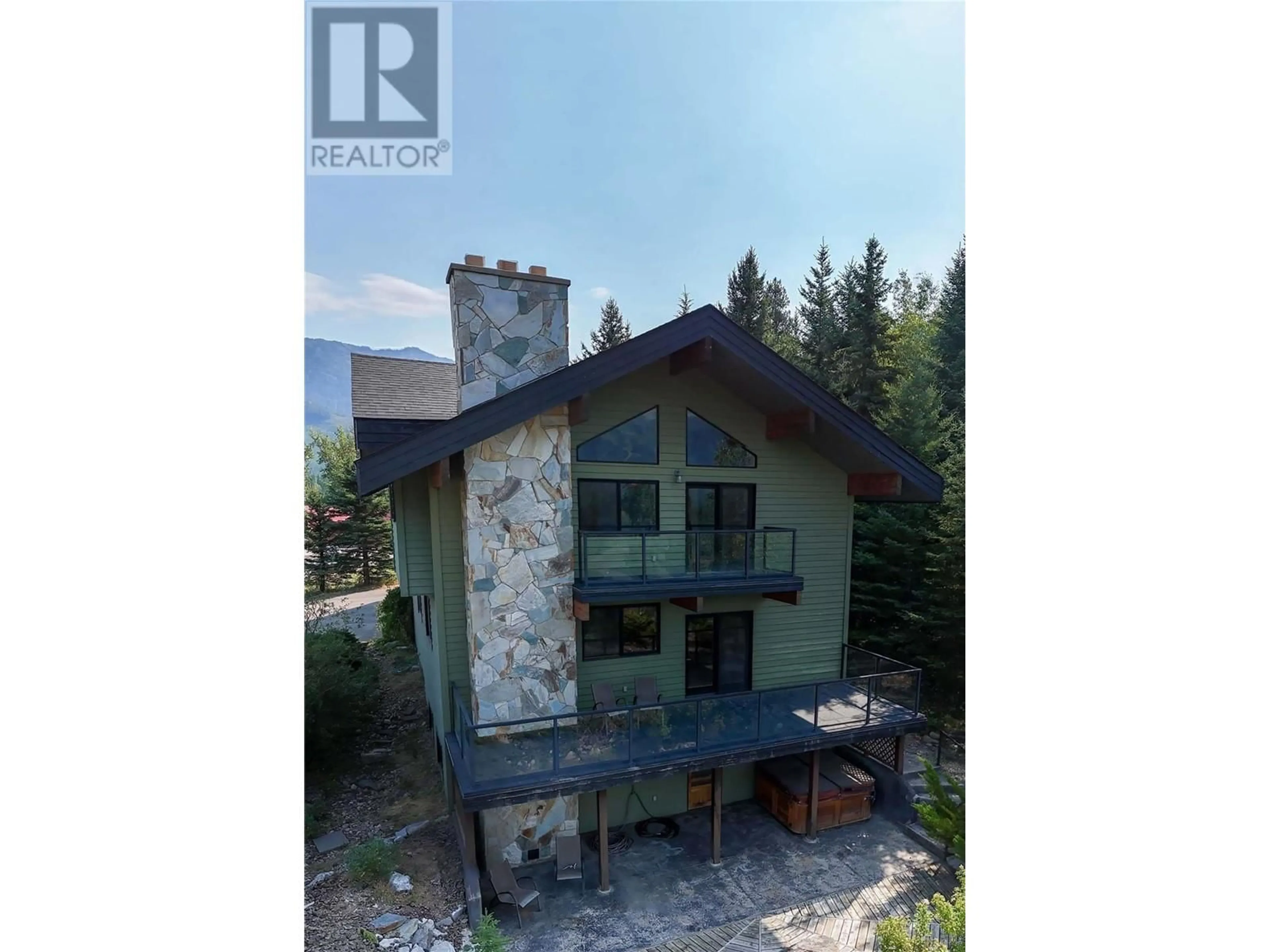 A pic from outside/outdoor area/front of a property/back of a property/a pic from drone, building for 24 CEDAR BOWL DRIVE, Fernie British Columbia V0B1M4