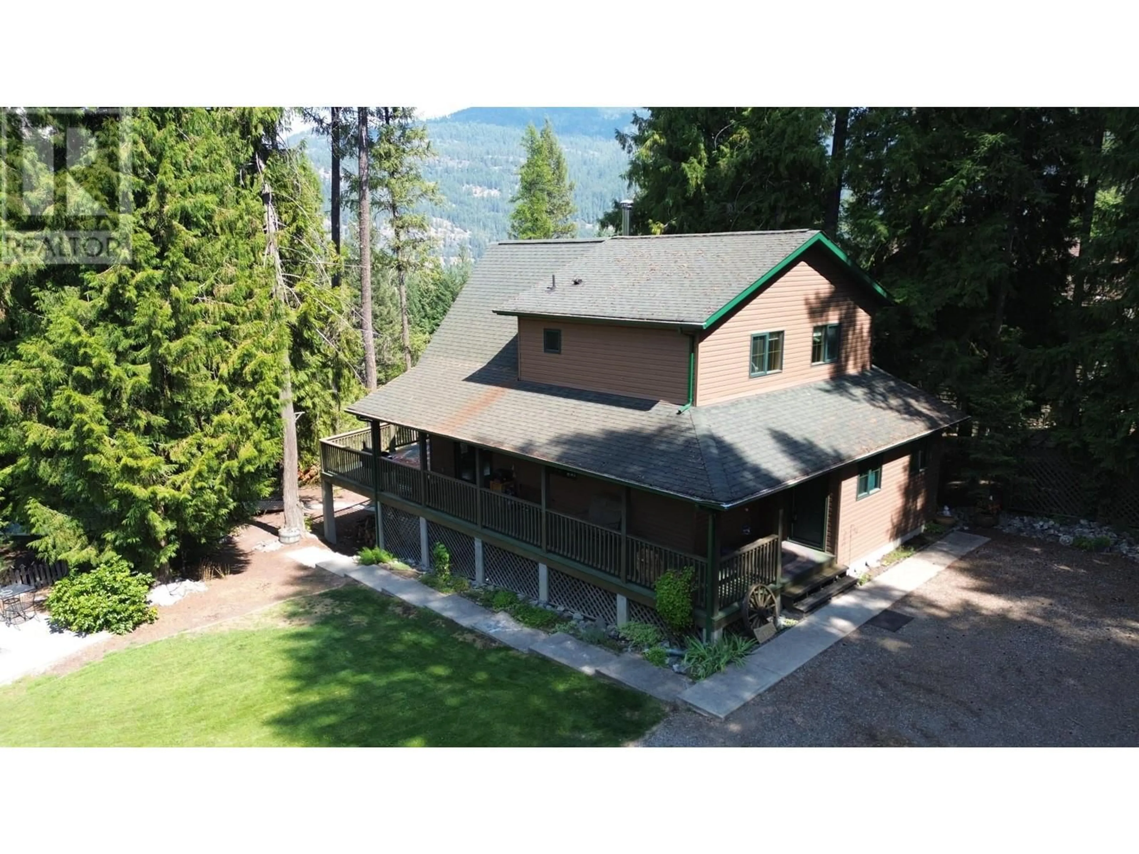 A pic from outside/outdoor area/front of a property/back of a property/a pic from drone, mountain view for 1360 FRISK ROAD, Christina Lake British Columbia V0H1E0
