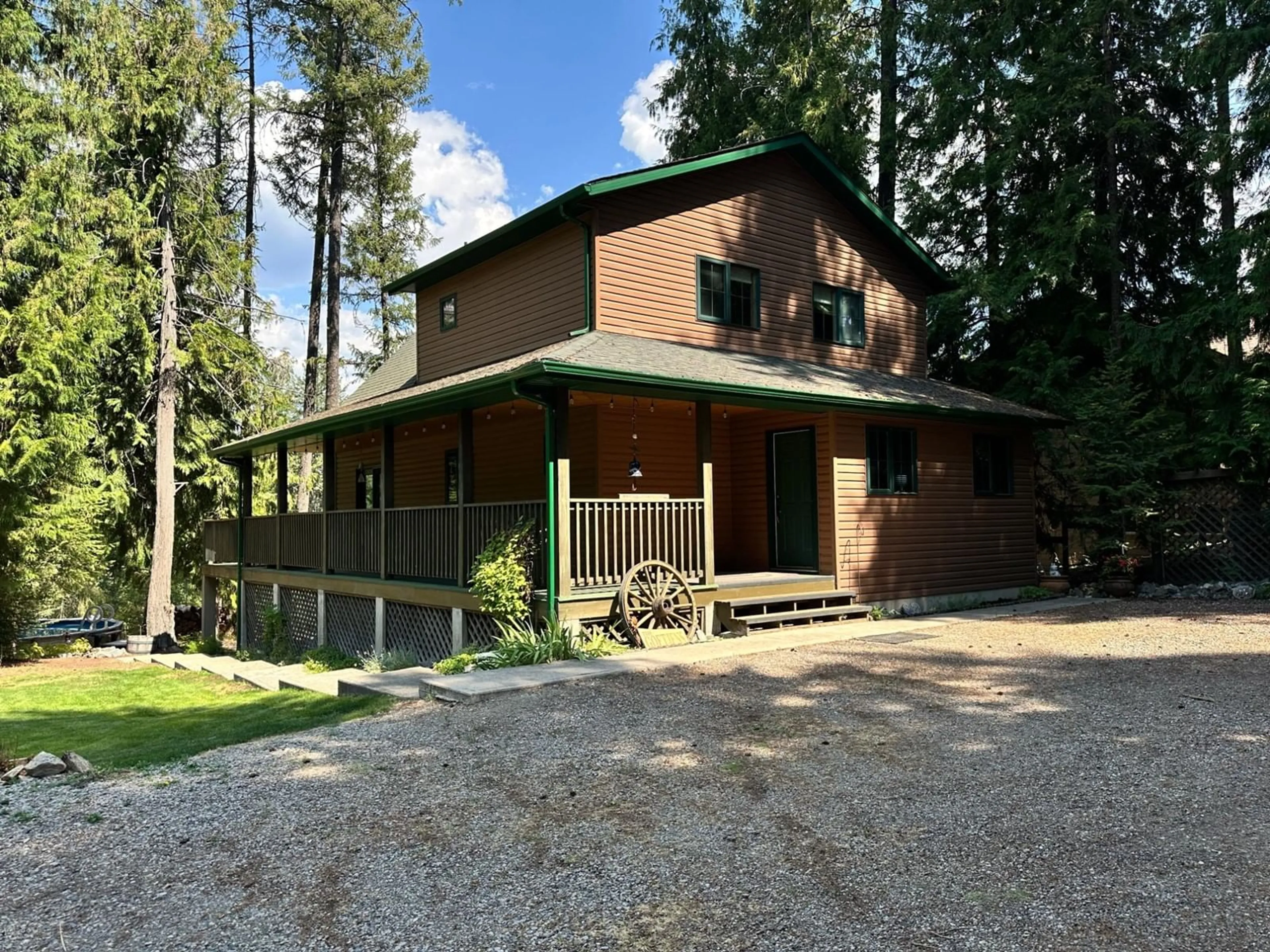 Frontside or backside of a home, cottage for 1360 FRISK Road, Christina Lake British Columbia V0H1E0