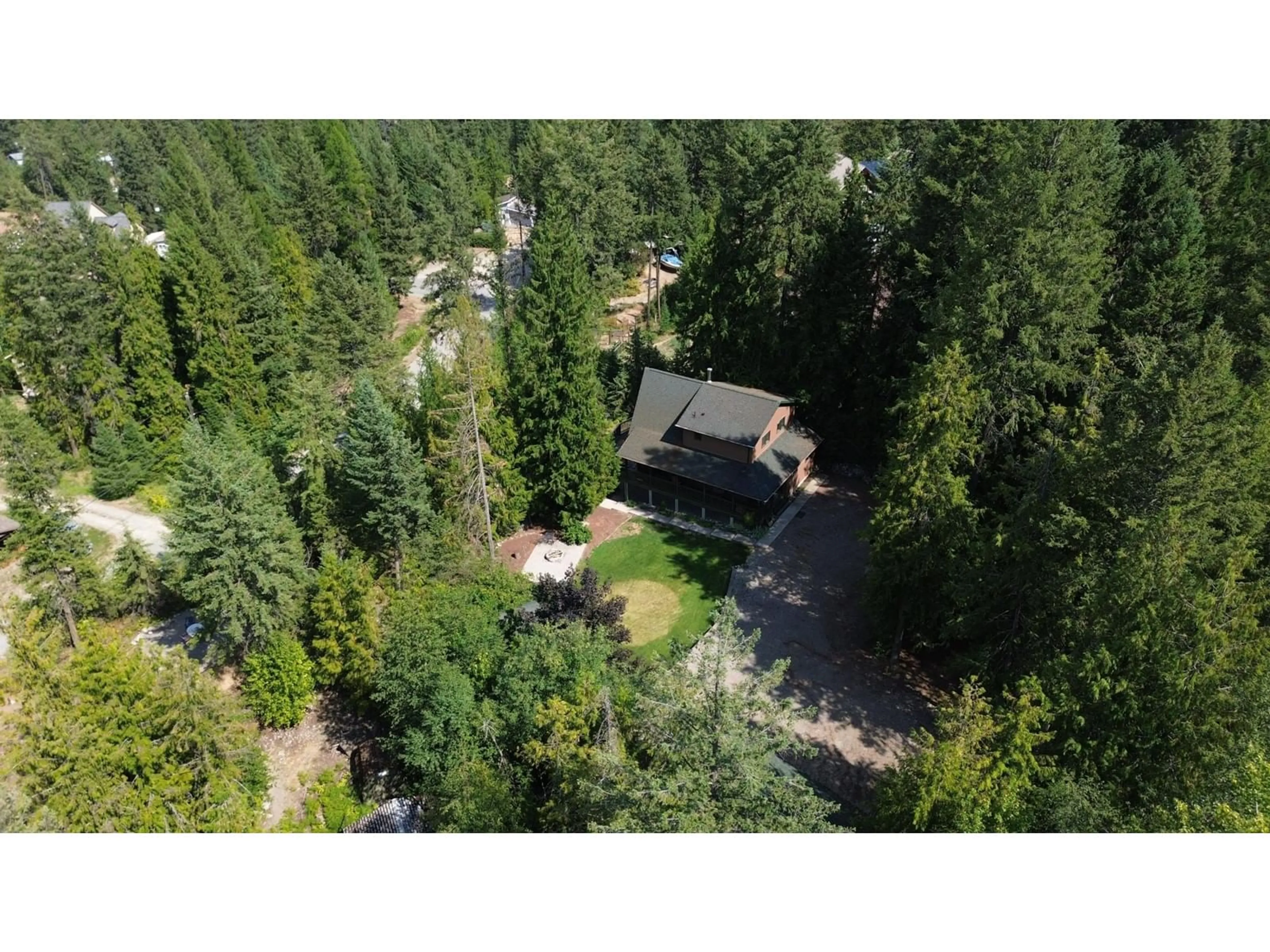 Frontside or backside of a home, cottage for 1360 FRISK Road, Christina Lake British Columbia V0H1E0