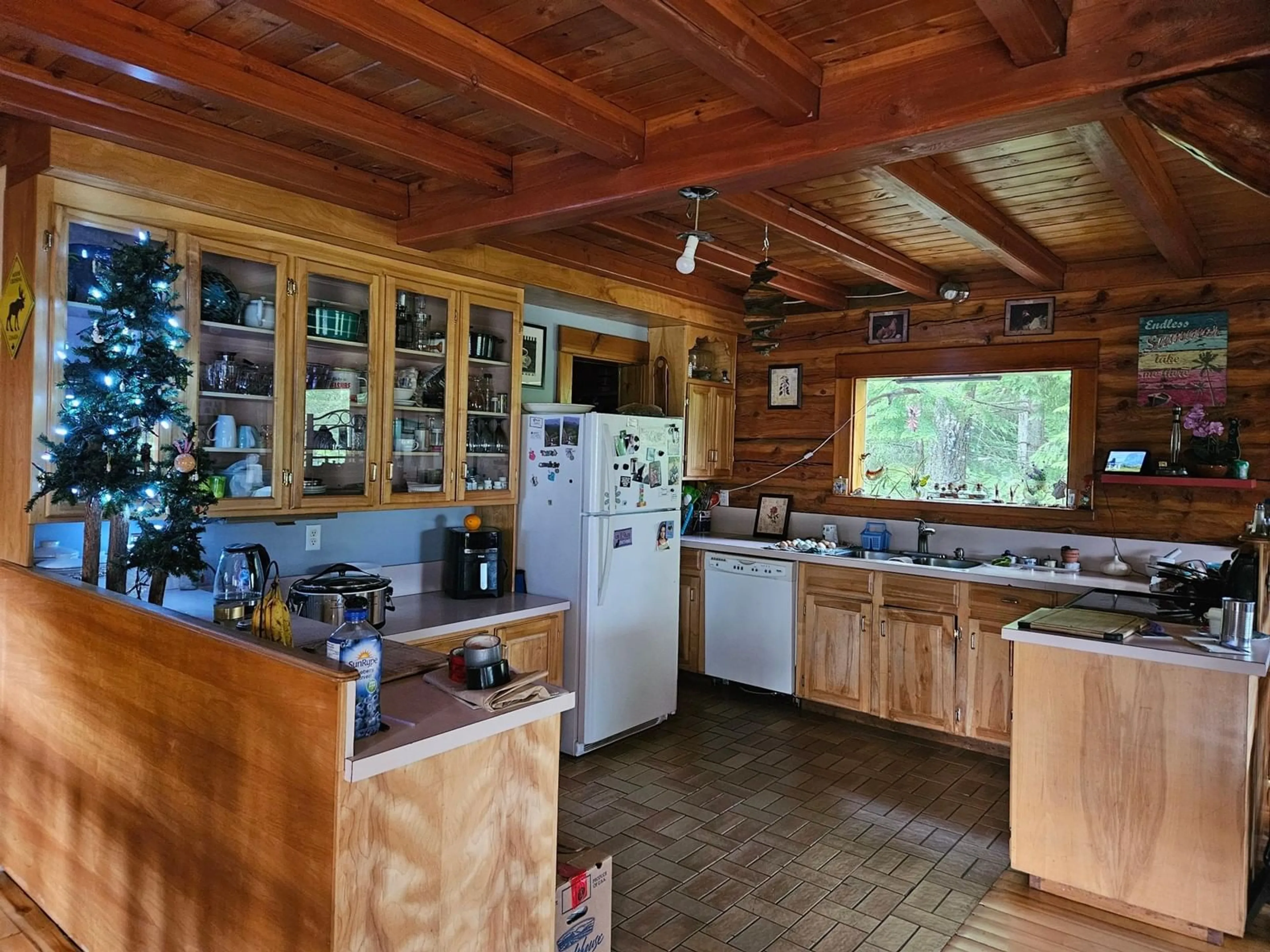 Kitchen, wood floors, cottage for 7703 6 Highway, Fauquier British Columbia V0G1K0