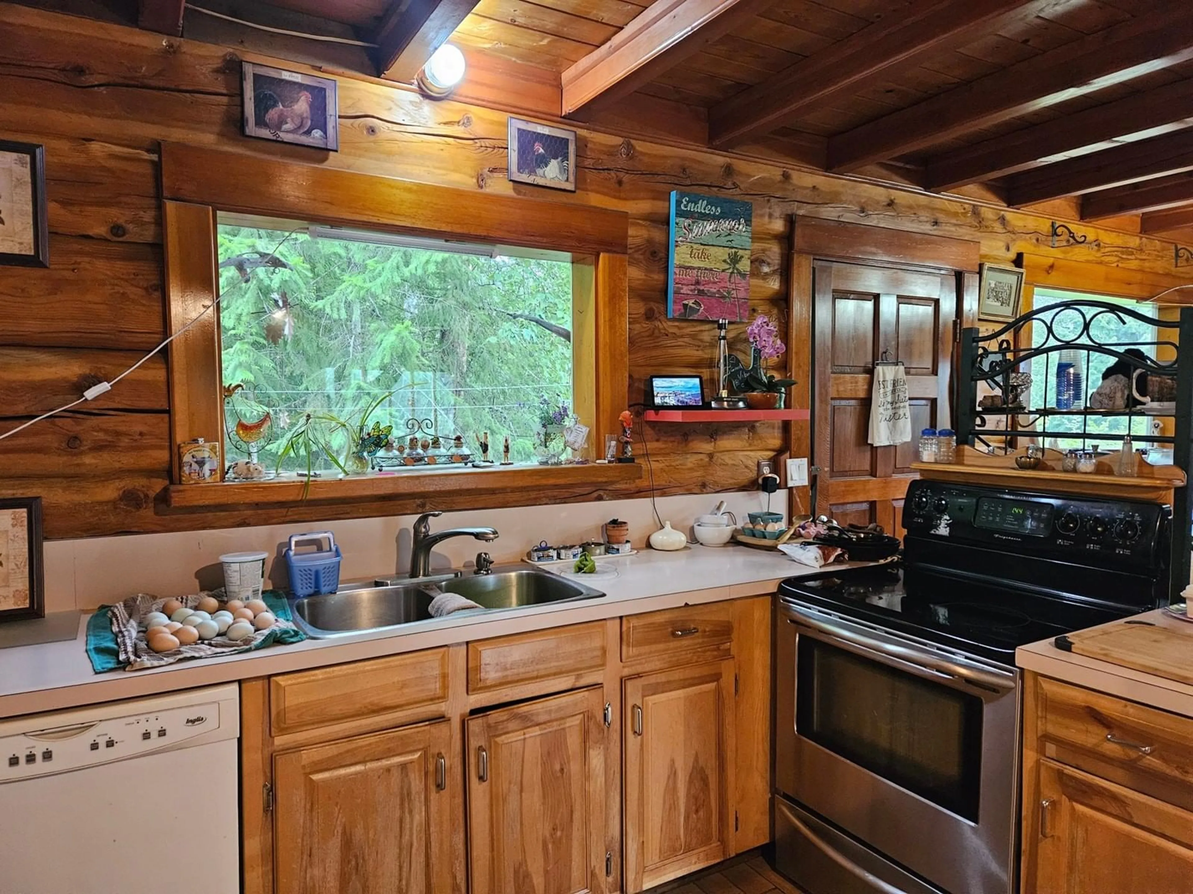 Kitchen, wood floors, cottage for 7703 6 Highway, Fauquier British Columbia V0G1K0