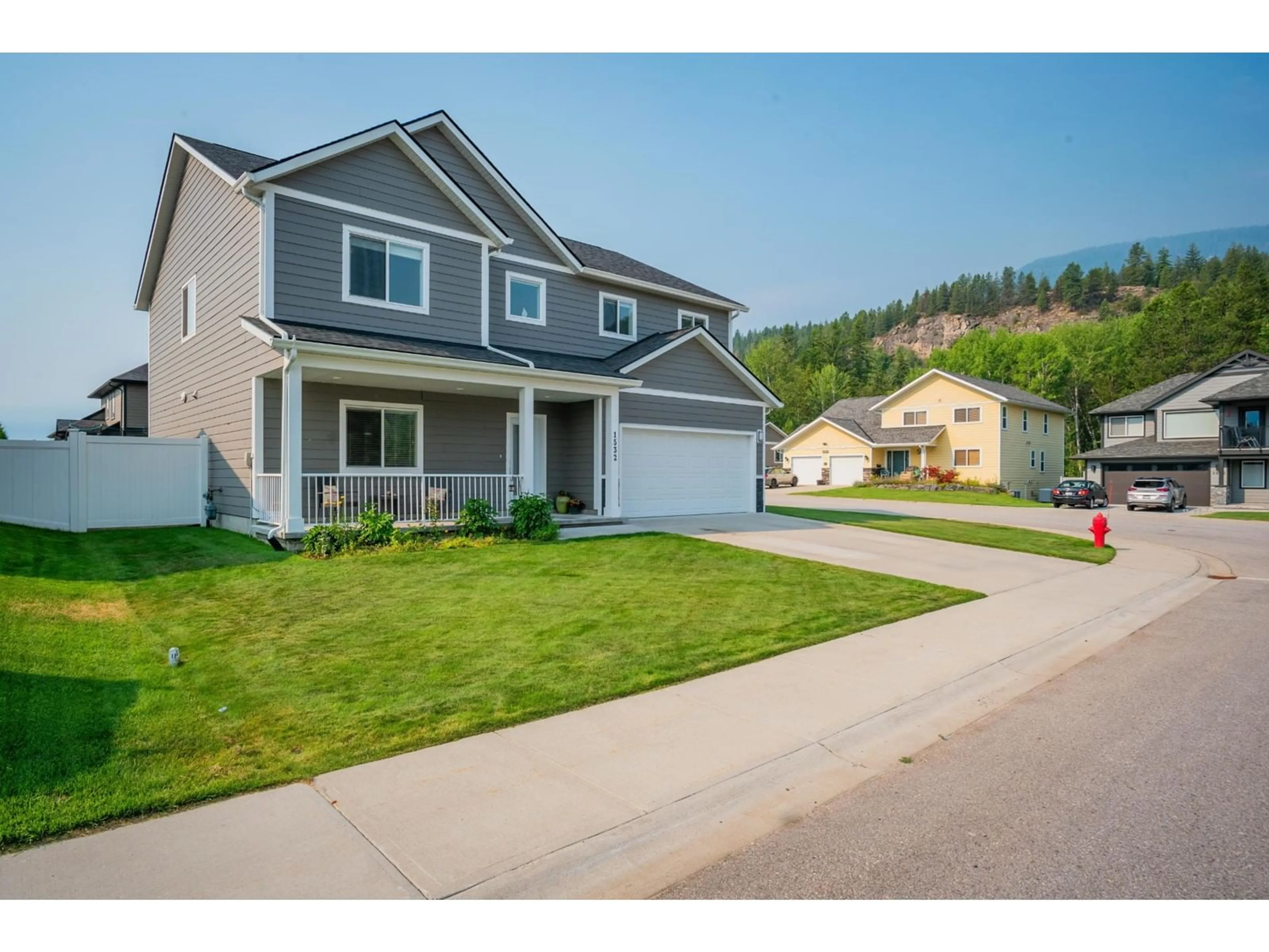 Frontside or backside of a home, the street view for 1532 ASPEN Lane, Castlegar British Columbia V1N4X8