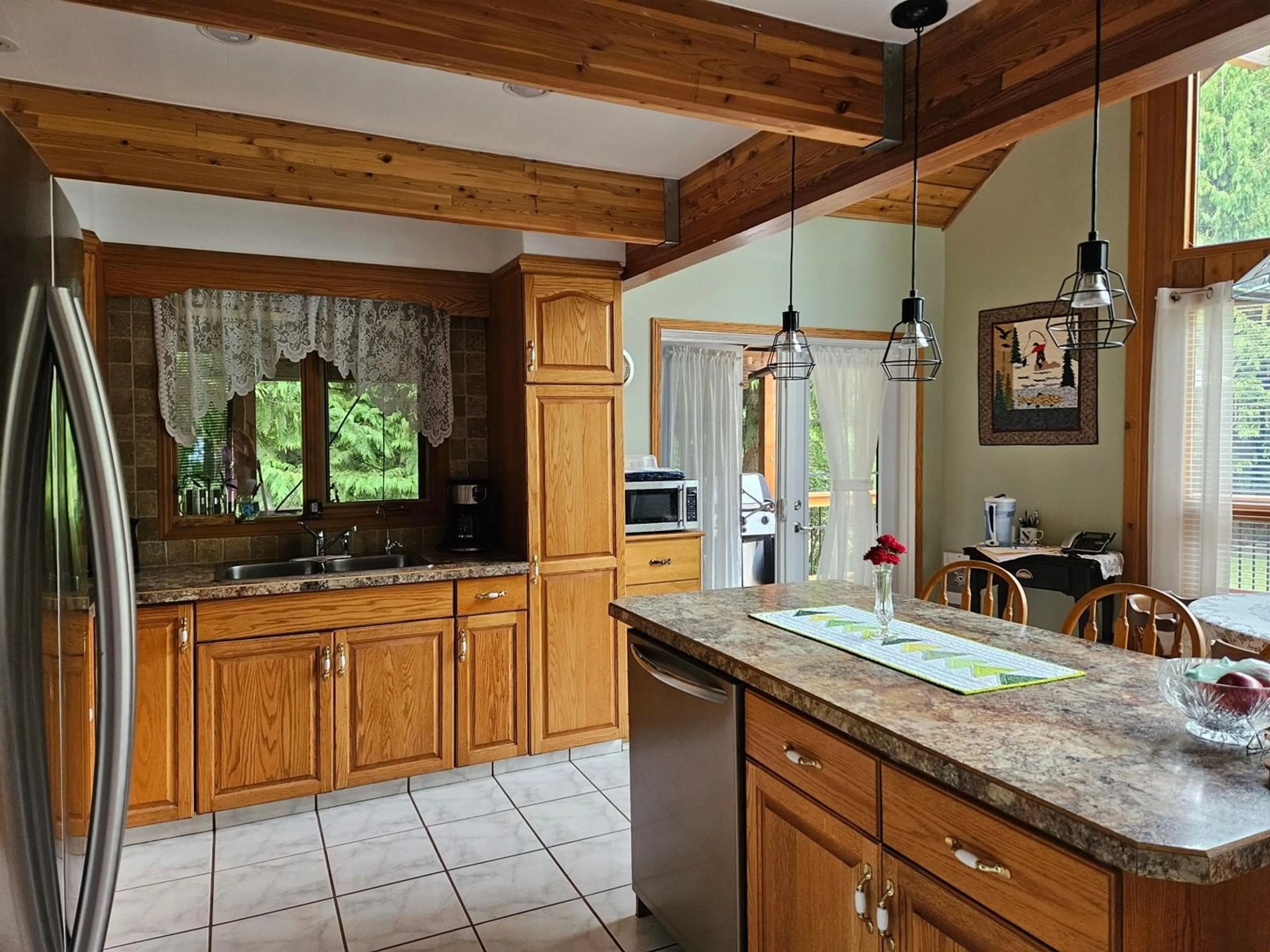 Rustic kitchen, wood floors, cottage for 432 BAYLES Road, Nakusp British Columbia V0G1R1