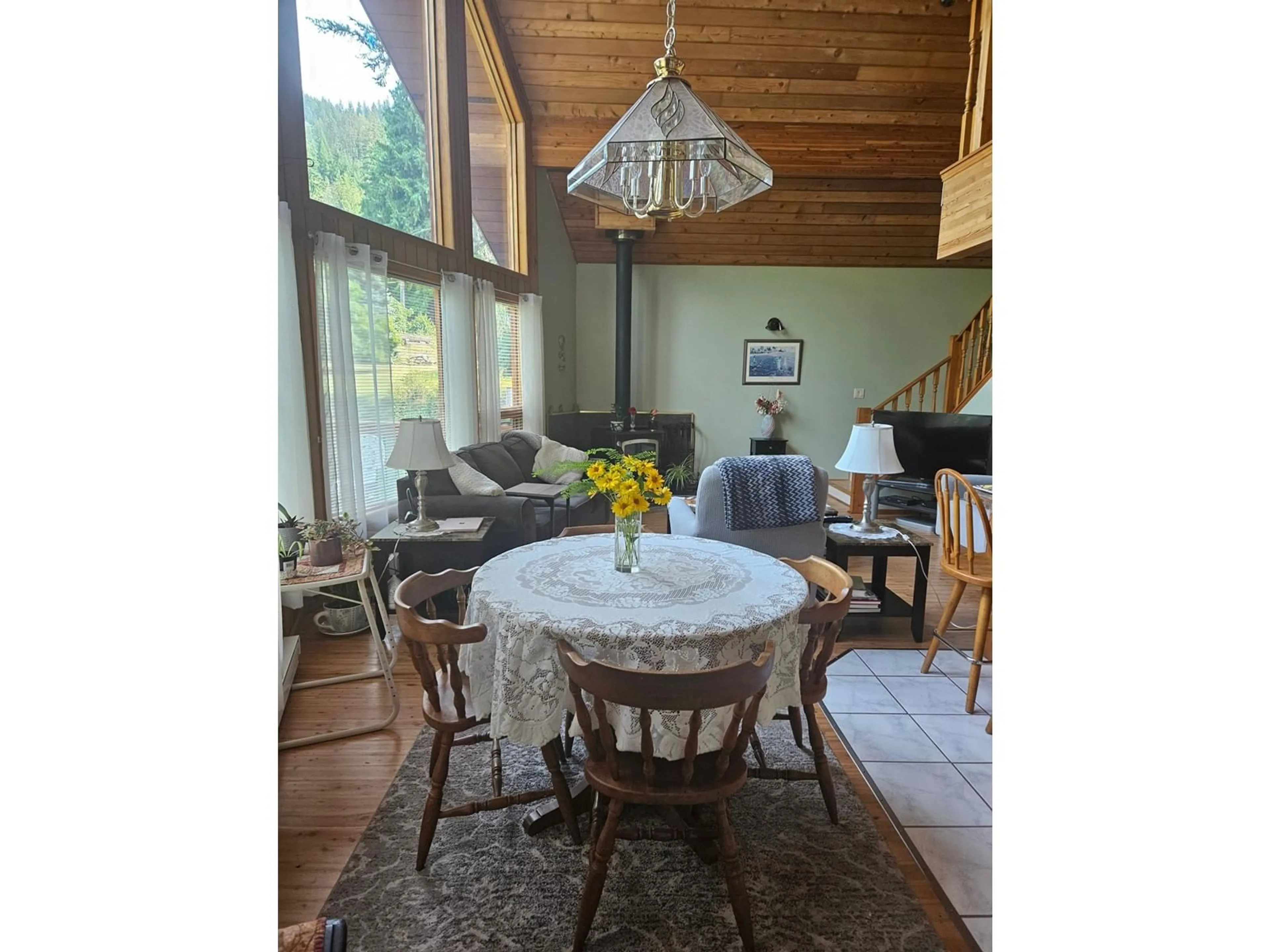 Dining room, wood floors, cottage for 432 BAYLES Road, Nakusp British Columbia V0G1R1