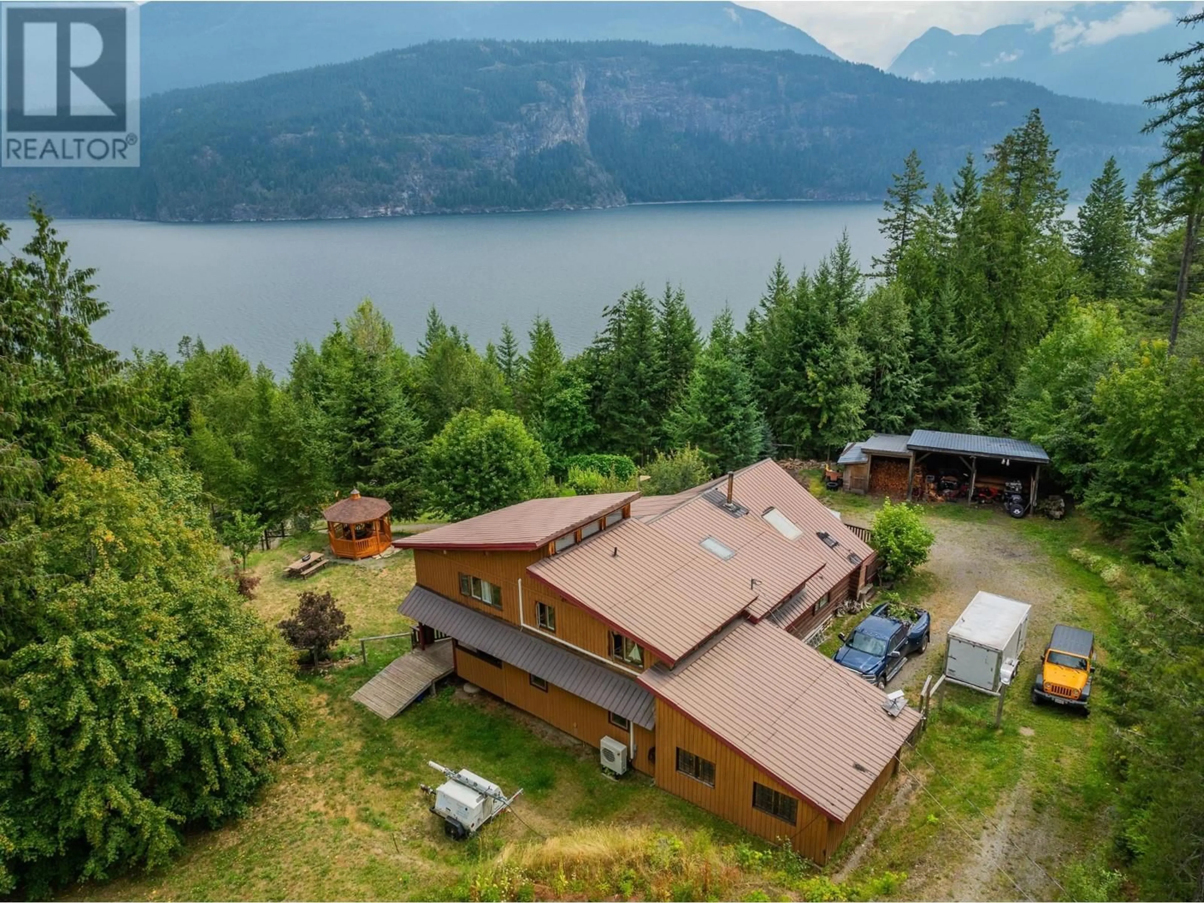 A pic from outside/outdoor area/front of a property/back of a property/a pic from drone, water/lake/river/ocean view for 9413 SHUTTY BENCH ROAD, Kaslo British Columbia V0G1M0