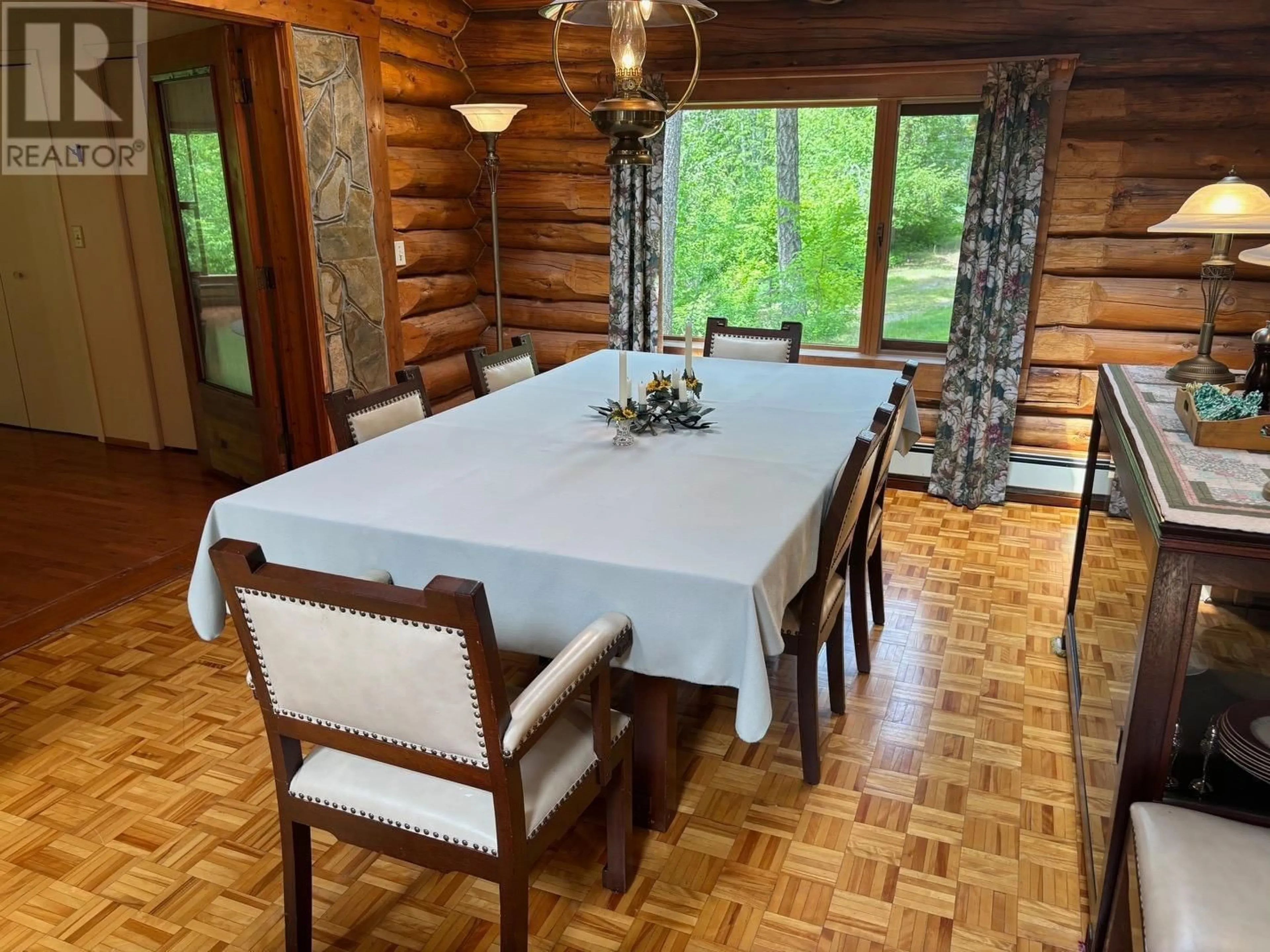 Dining room, wood/laminate floor for 1980 SNOWBALL CREEK ROAD, Grand Forks British Columbia V0H1H1