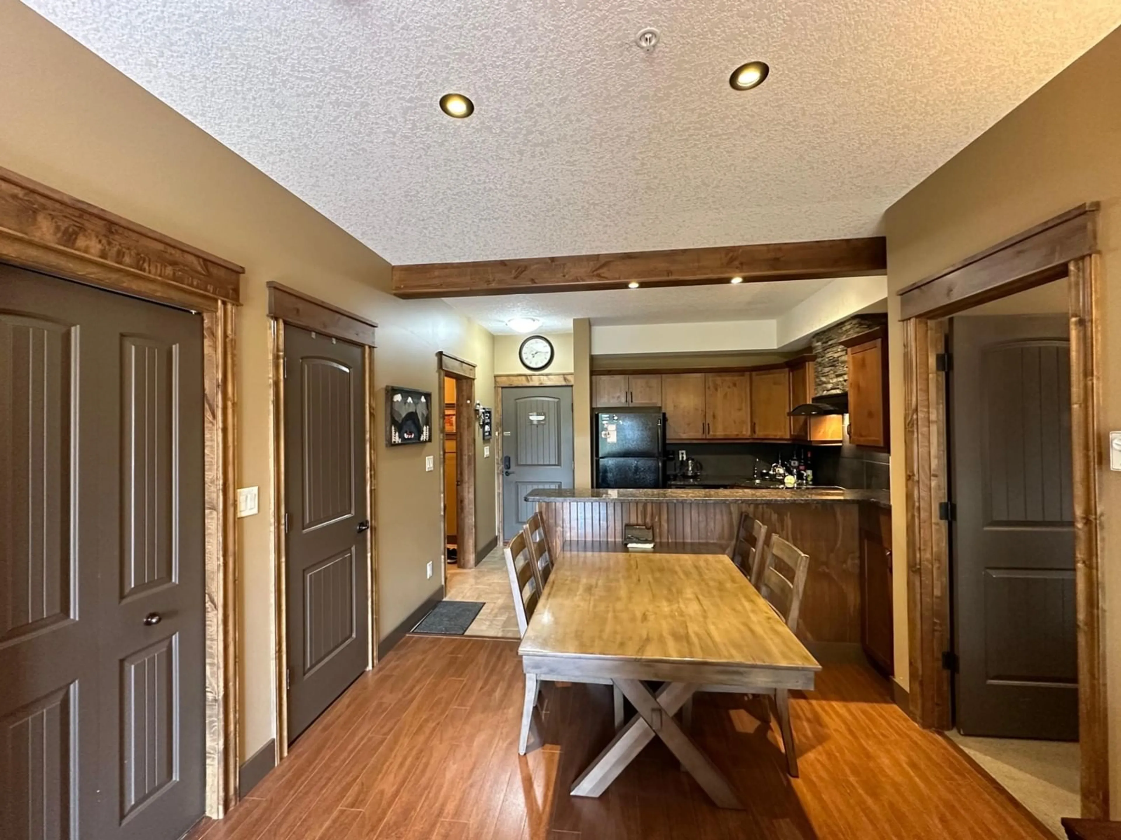 Dining room, wood floors, cottage for 7495 COLUMBIA Avenue Unit# 2203, Radium Hot Springs British Columbia V0A1M0