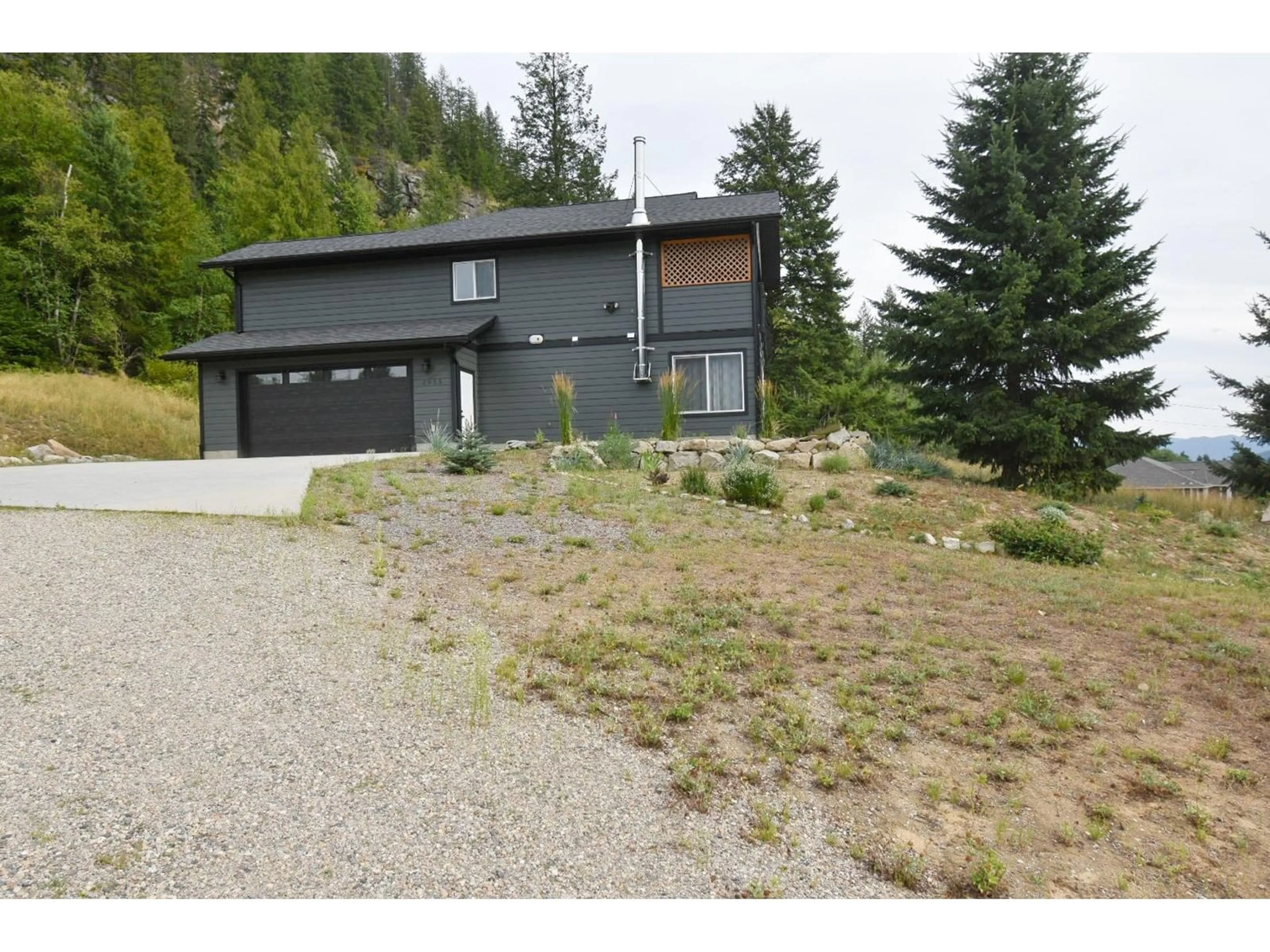 A pic from exterior of the house or condo, the street view for 1955 SANDY Road, Castlegar British Columbia V1N4T1