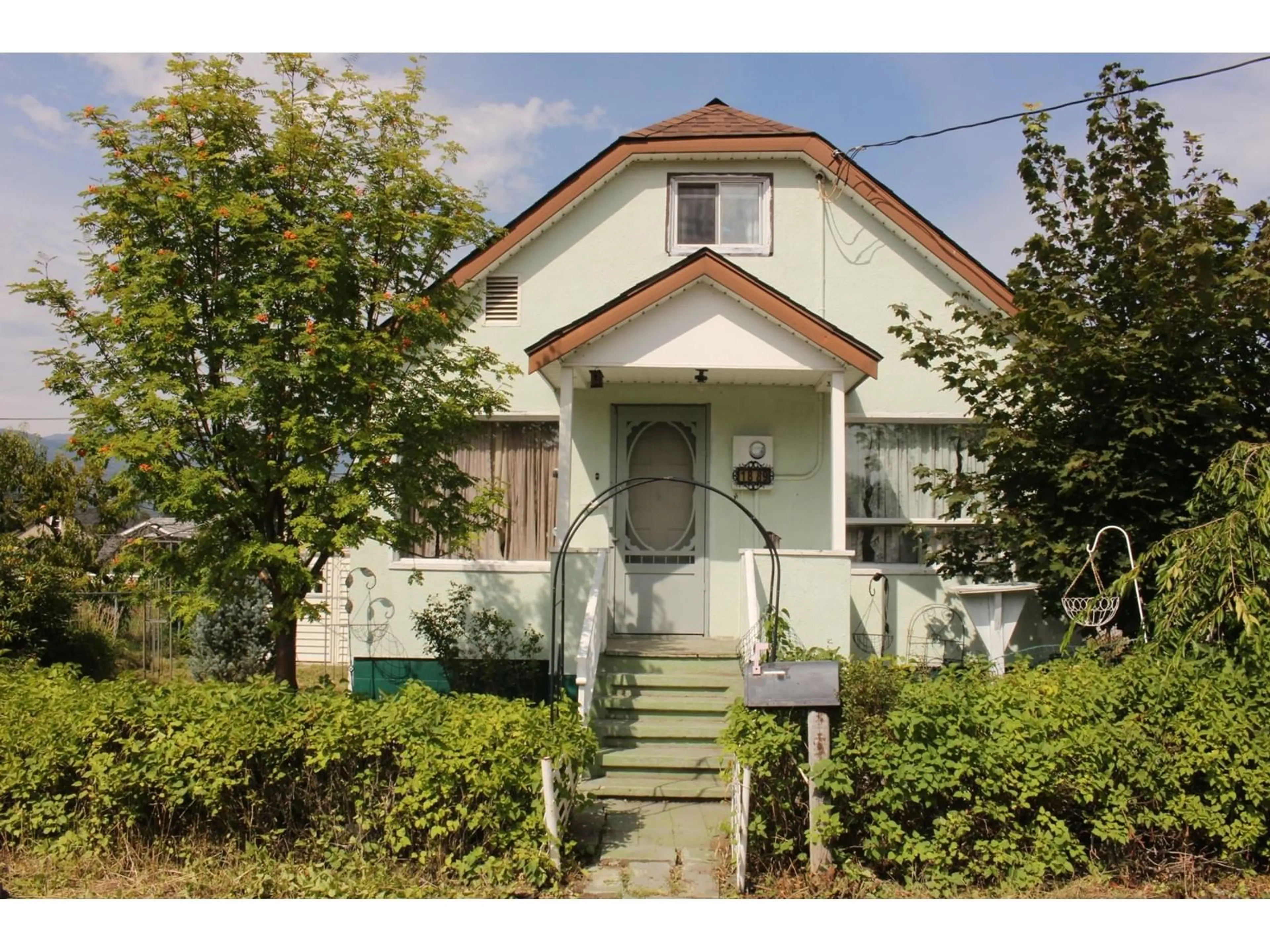 Frontside or backside of a home, cottage for 1889 BOWSER Street, Trail British Columbia V1R2Z5