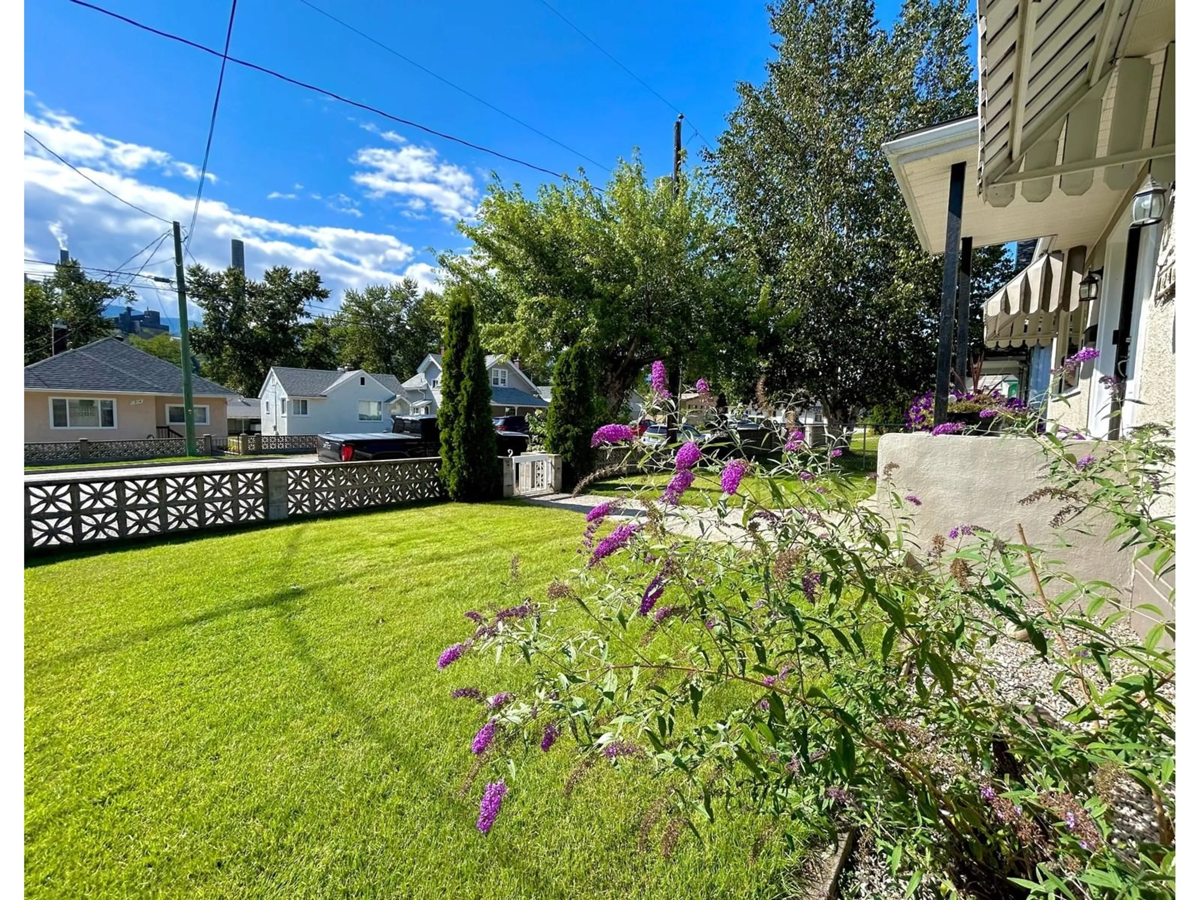 A pic from exterior of the house or condo, the fenced backyard for 1217 COLUMBIA Avenue, Trail British Columbia V1R1J3