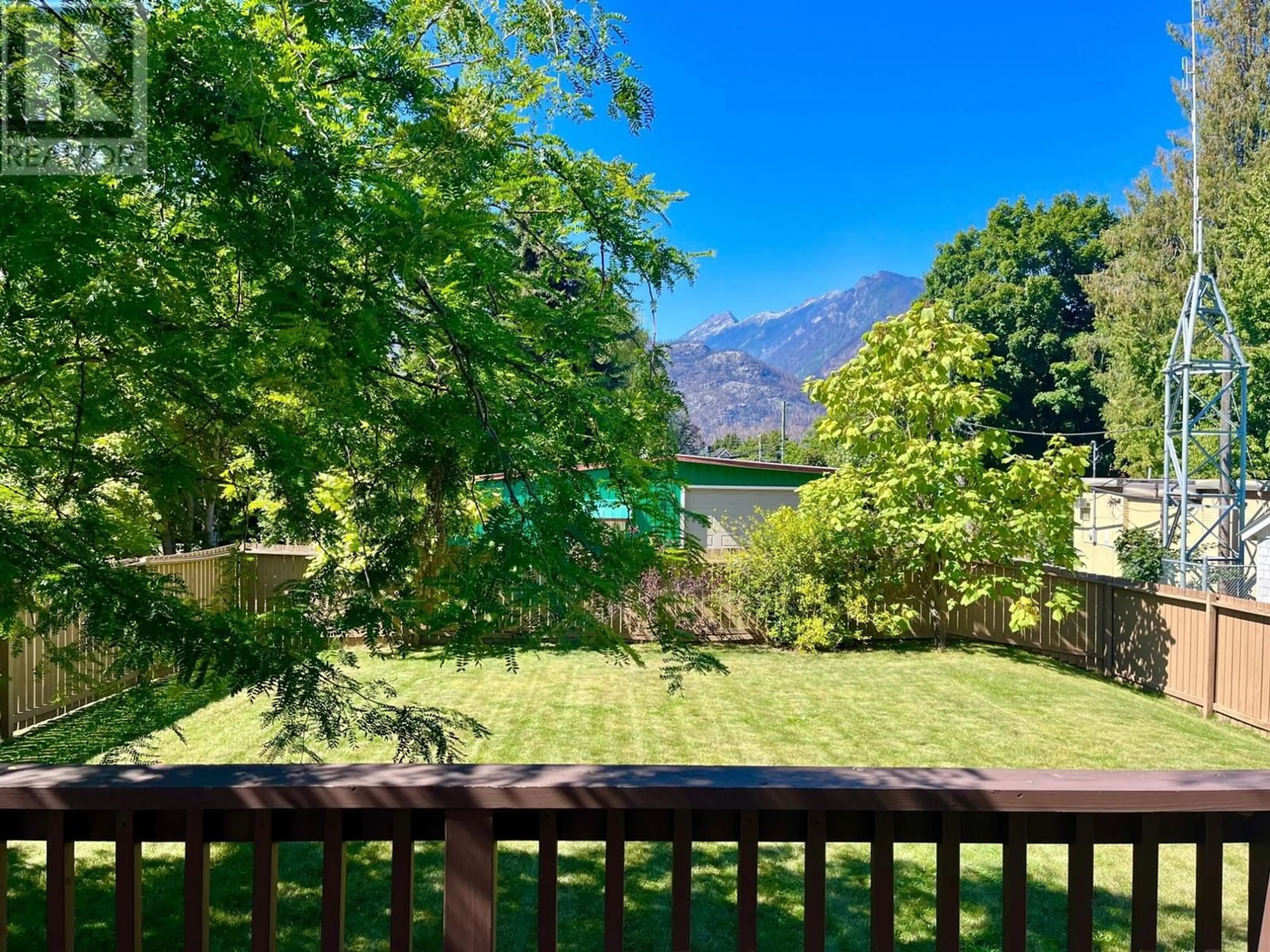 A pic from outside/outdoor area/front of a property/back of a property/a pic from drone, water/lake/river/ocean view for 811 KILDARE STREET, New Denver British Columbia V0G1S0