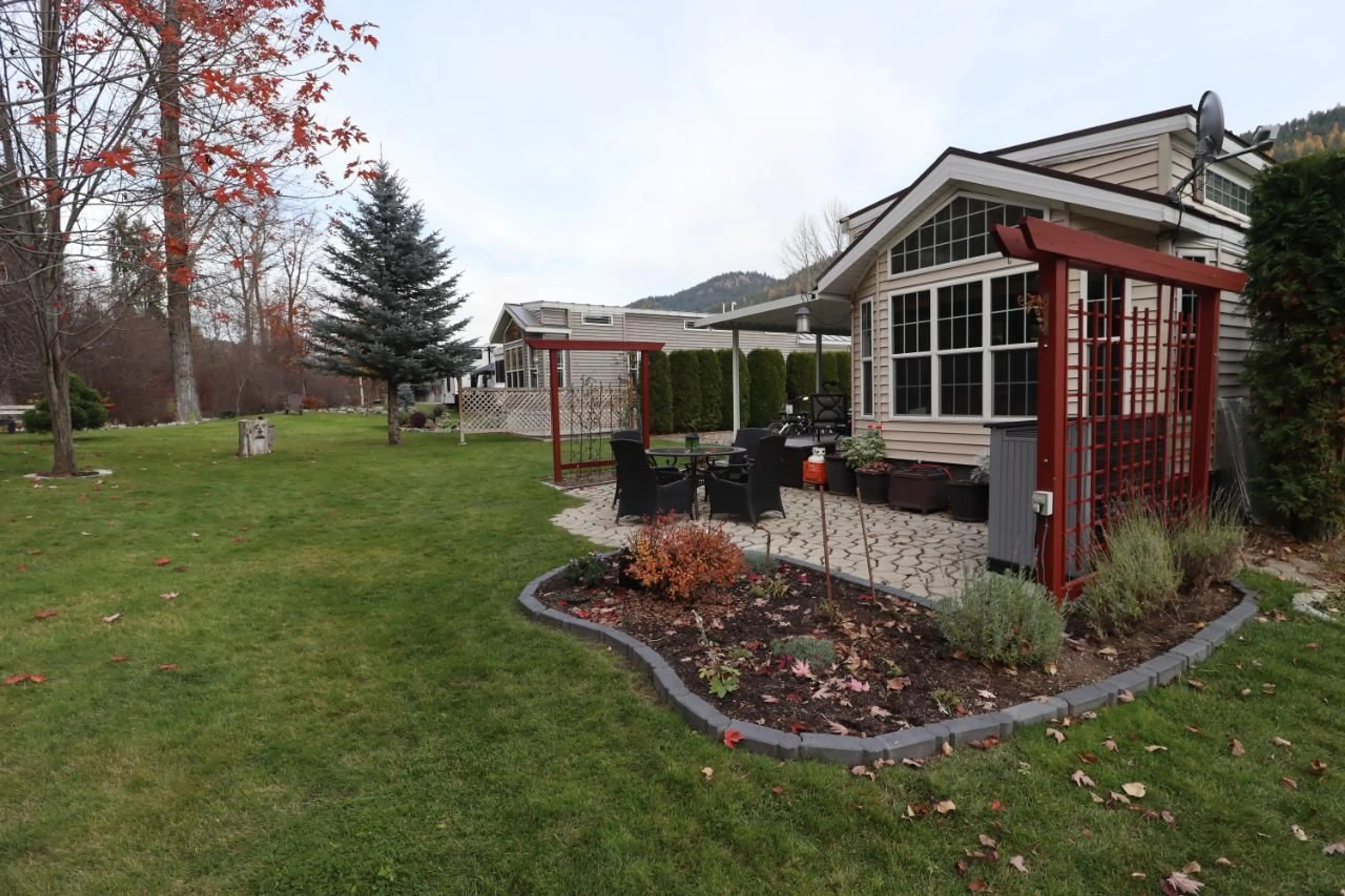 Patio, the fenced backyard for 321 COPPER  N Avenue Unit# 55, Greenwood British Columbia V0H1J0